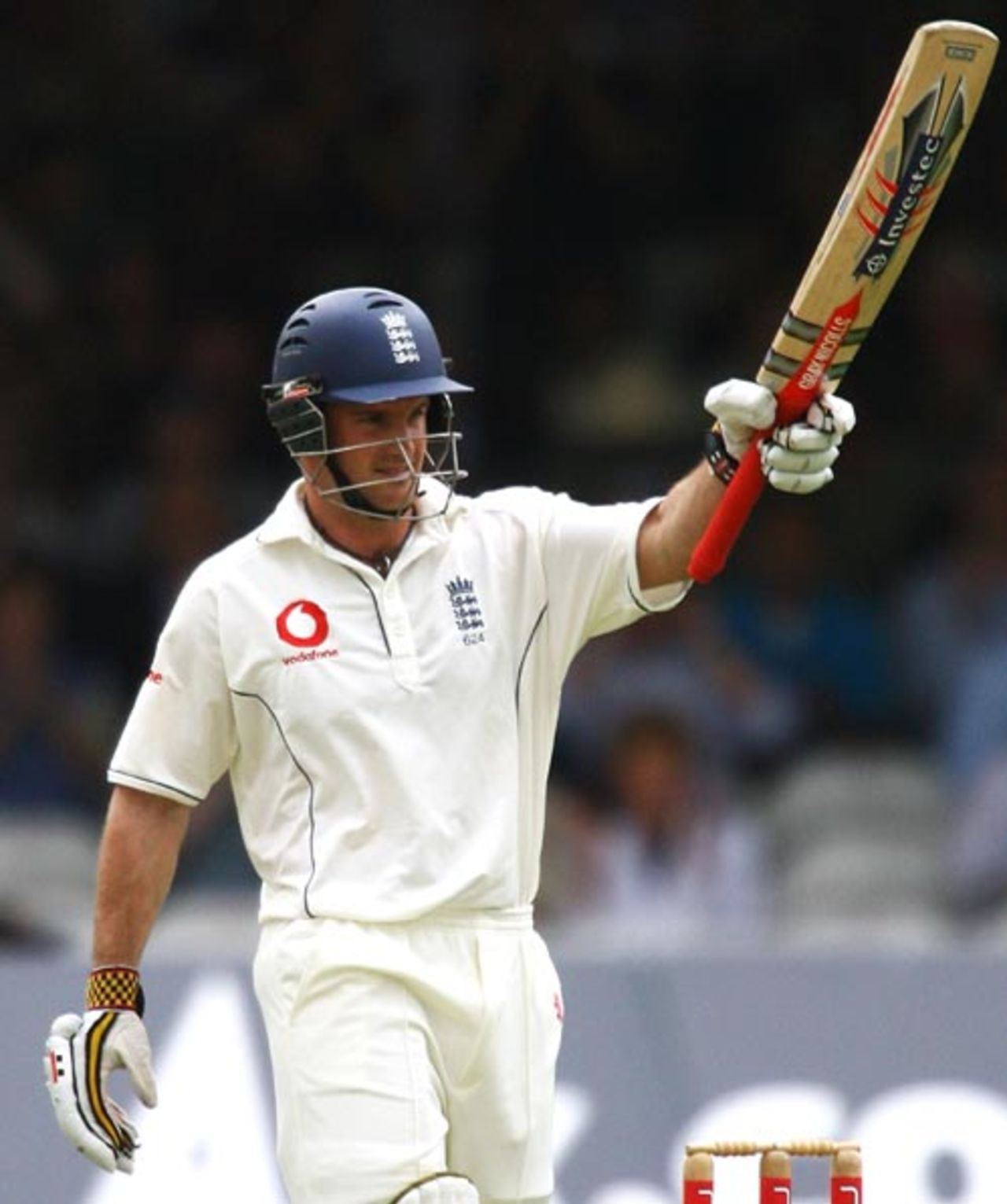 Andrew Strauss raises his bat after scoring a fifty, England v India, 1st Test, Lord's, 1st day, July 19 , 2007