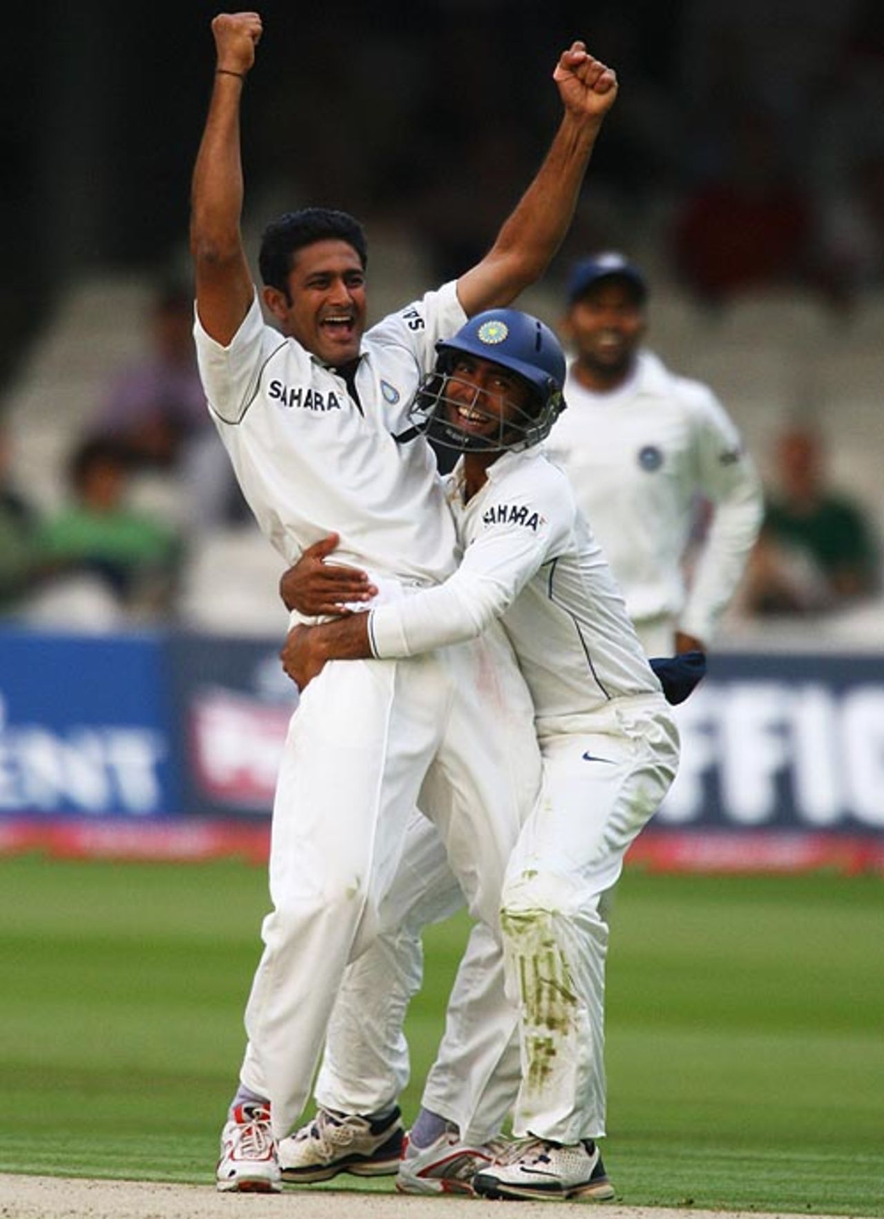 Anil Kumble and Dinesh Karthik are overjoyed at the fall of Paul Collingwood, out leg-before wicket as India clawed their way back. Kumble became the bowler with the highest number of leg-before dismissals in Tests, England v India, 1st Test, Lord's, 1st day, July 19, 2007