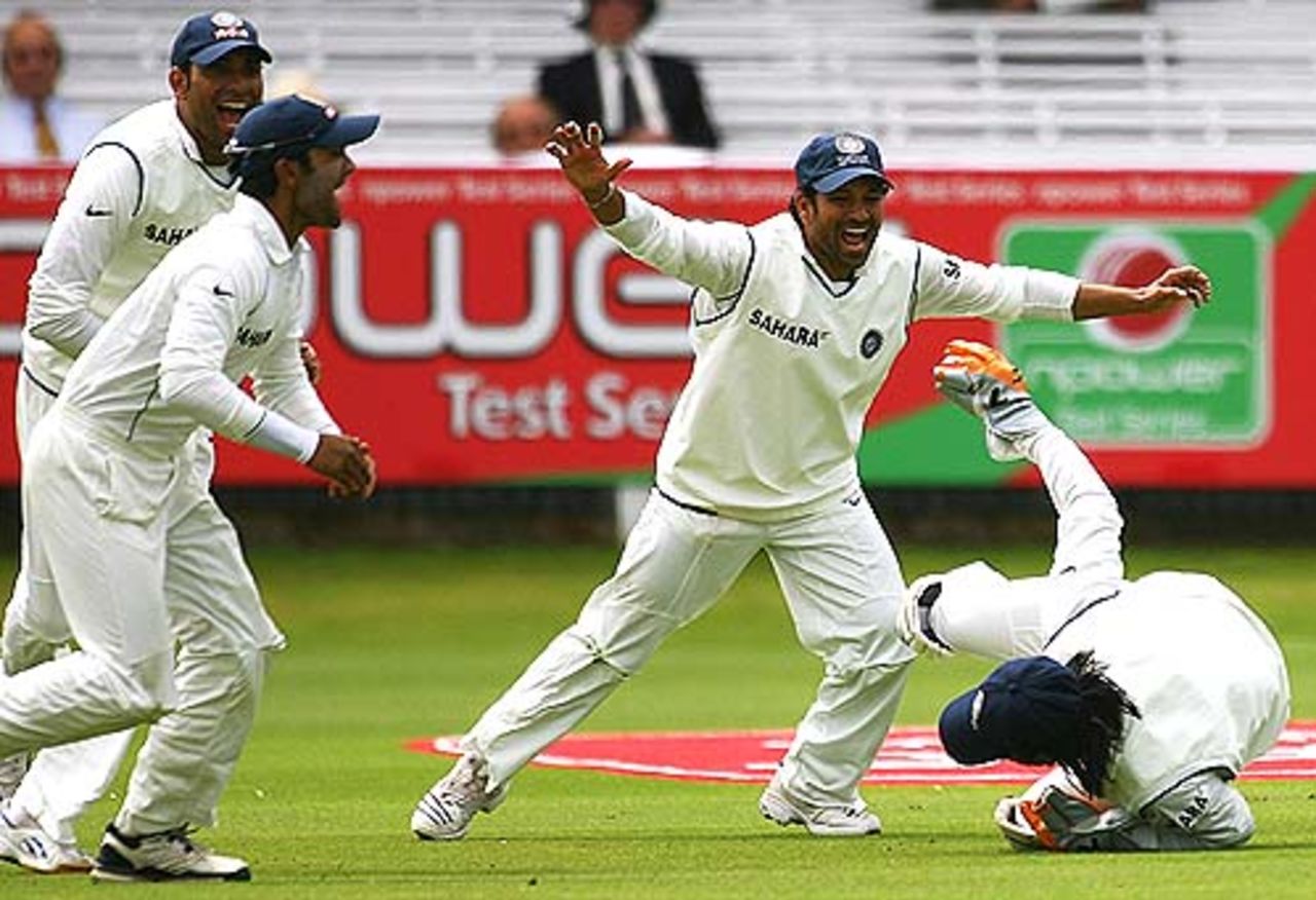 India celebrate as Mahendra Singh Dhoni takes a catch to dismiss Kevin Pietersen. The dismissal was later overturned by the third umpire, England  v India, 1st Test, Lord's, 2nd day, July 20, 2007