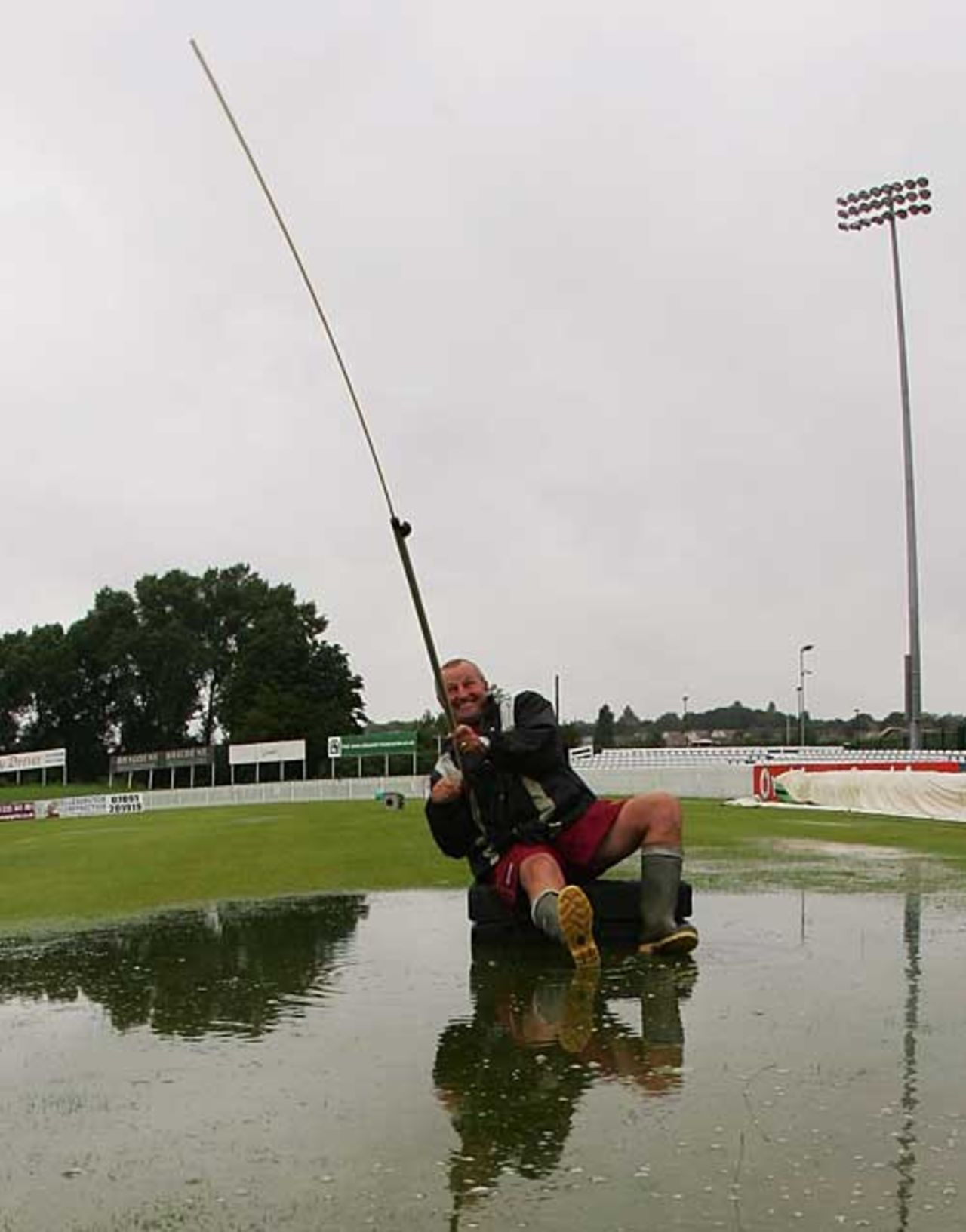 Derbyshire groundsman Bub Hatton finds conditions better for fishing than cricket at Derby, Derbyshire v Glamorgan, County Championship, Derby, July 21, 2007