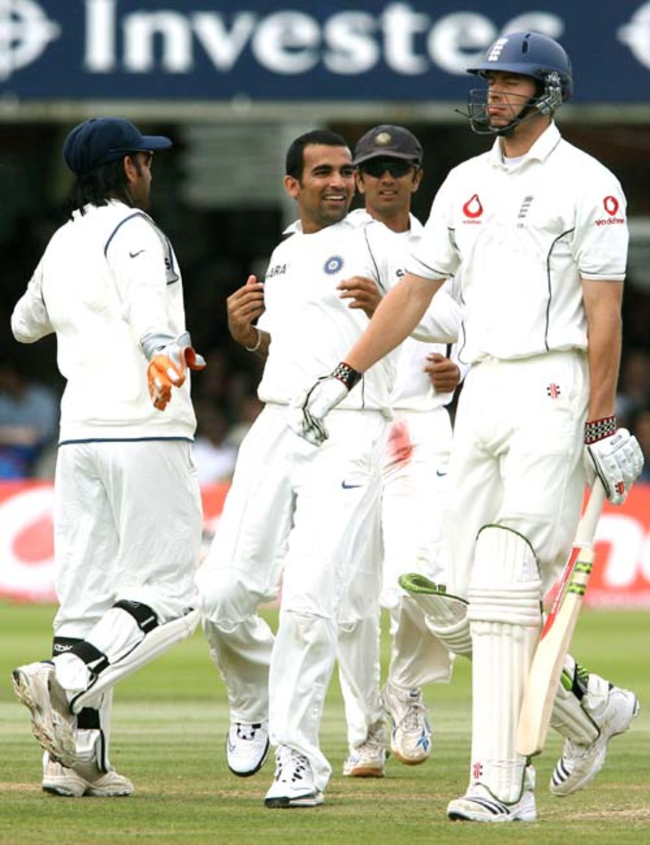 Zaheer Khan celebrates with Mahendra Singh Dhoni and Rahul Dravid, having dismissed Matt Prior and Chris Tremlett in successive deliveries, England v India, 1st Test, Lord's, 4th day, July 22, 2007
