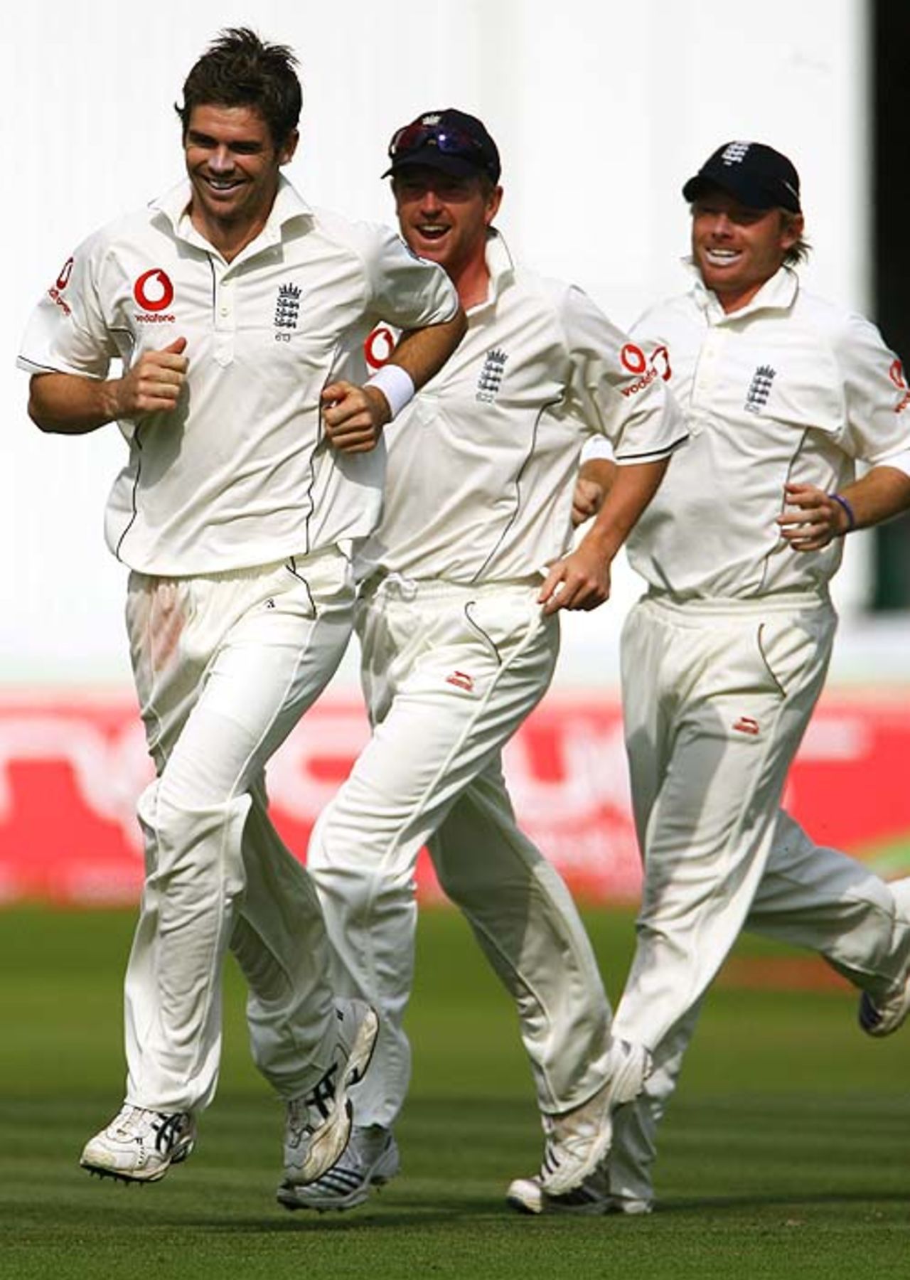 James Anderson, Paul Collingwood and Ian Bell play around after Anderson removed Wasim Jaffer, England v India, 1st Test, Lord's, 4th day, July 22, 2007