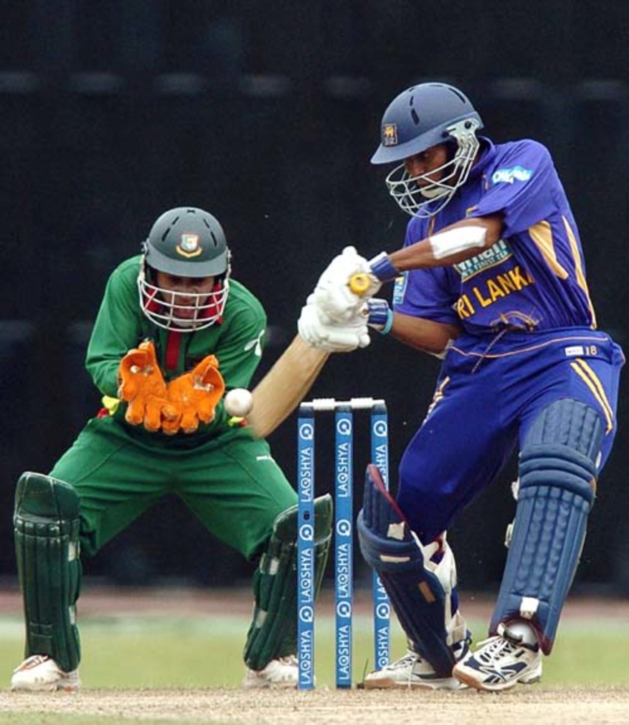 Tillakaratne Dilshan  is watched by  Mushfiqur Rahim as he nudges the ball to the off side, Sri Lanka v Bangladesh, 2nd ODI, Colombo, July 23, 2007