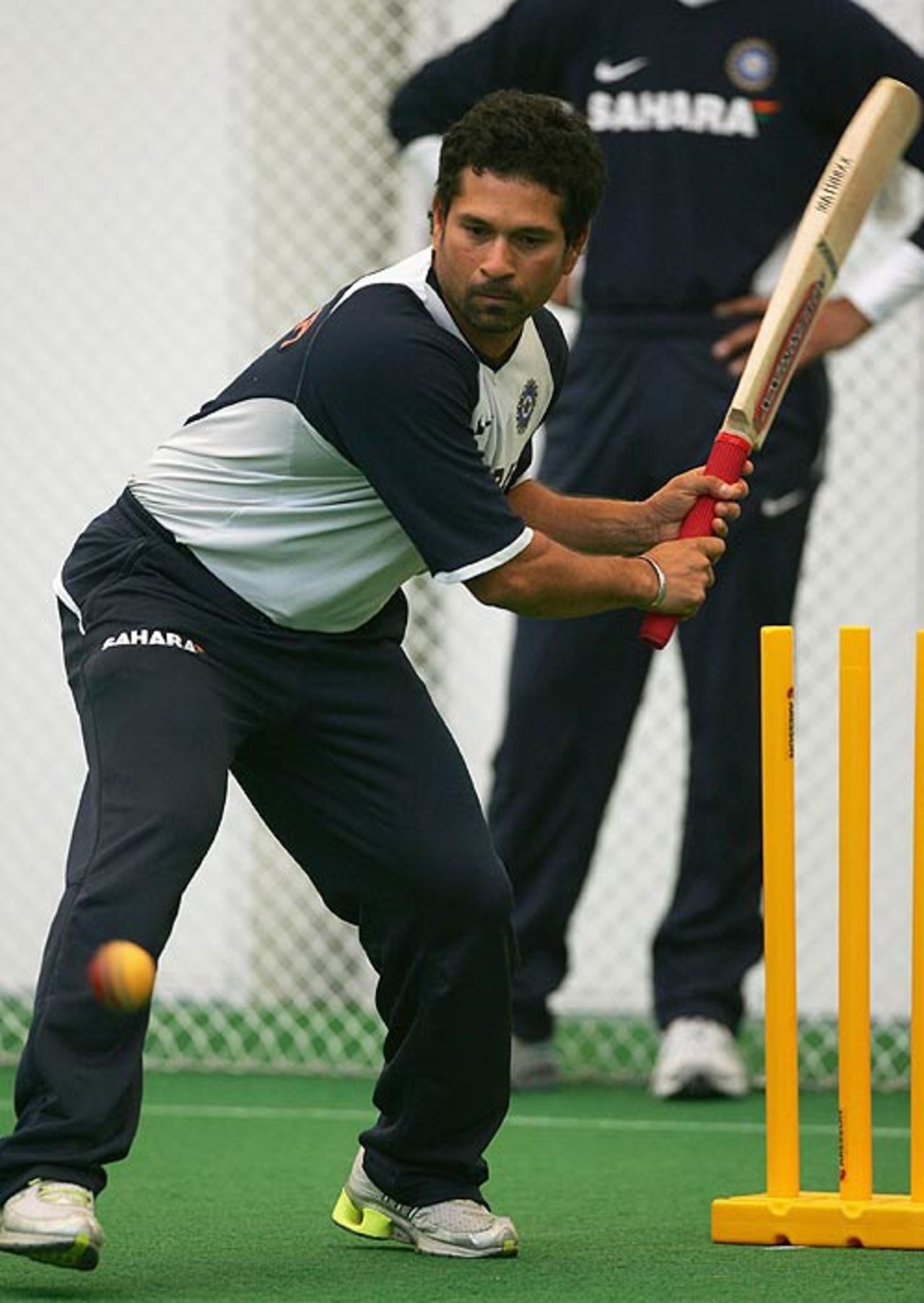 Sachin Tendulkar tries his luck left-handed during a nets session before the second Test against England, July 25, 2007