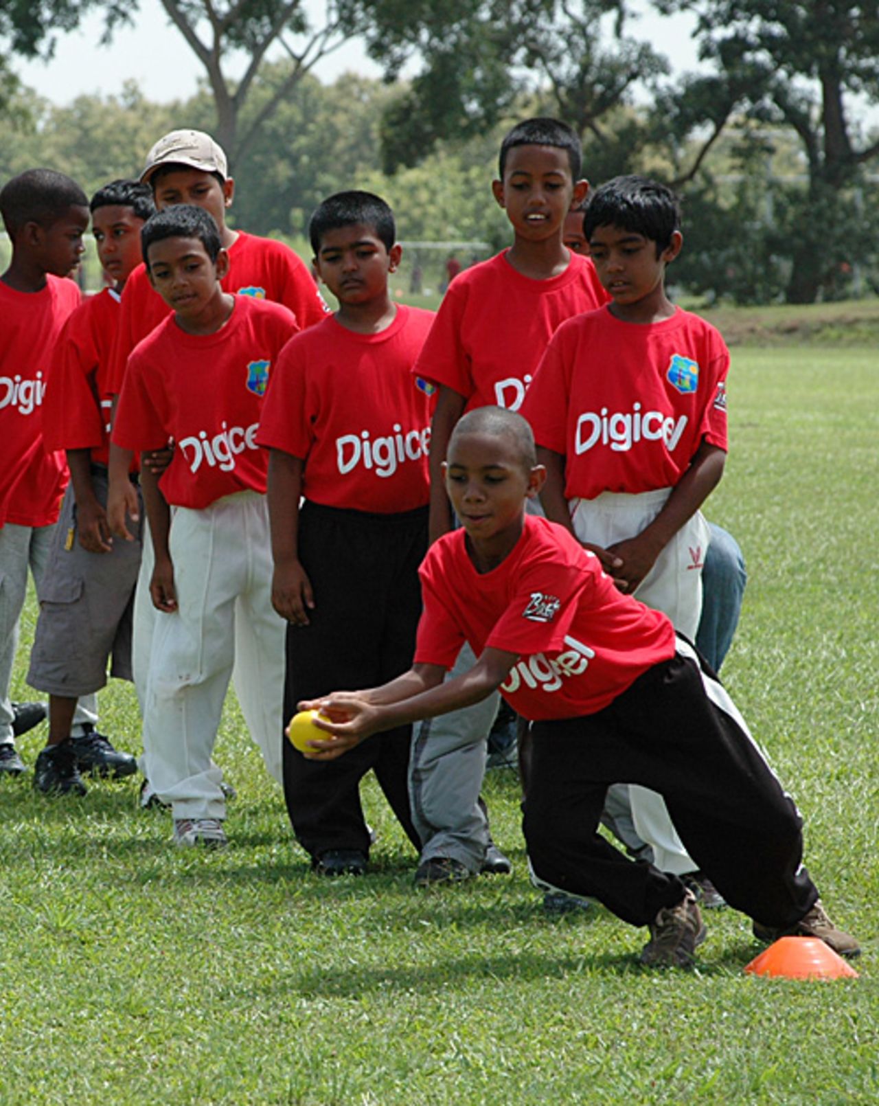 The future: young West Indians perform fielding exercises in a Digicel coaching clinic at the Sir Frank Worrell Cricket Centre, Balmain Couva, Trinidad, July 26, 2007