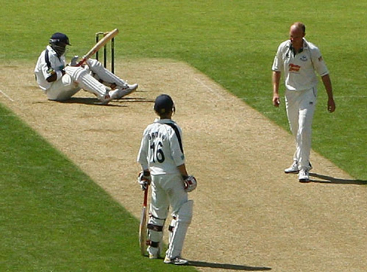 Michael Carberry is dumped on his backside by a Doug Bollinger bouncer, Hampshire v Worcestershire, Southampton, August 8, 2007