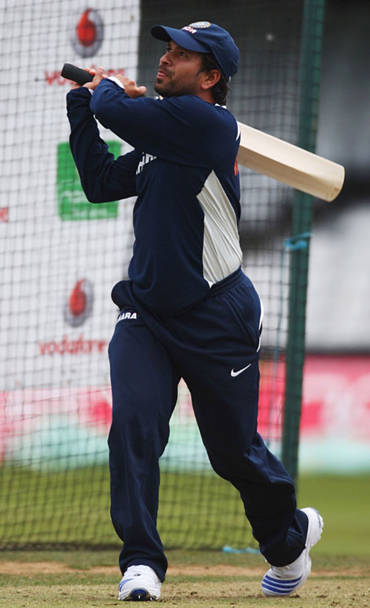 Sachin Tendulkar swings hard during India's afternoon nets, The Oval, August 8, 2007