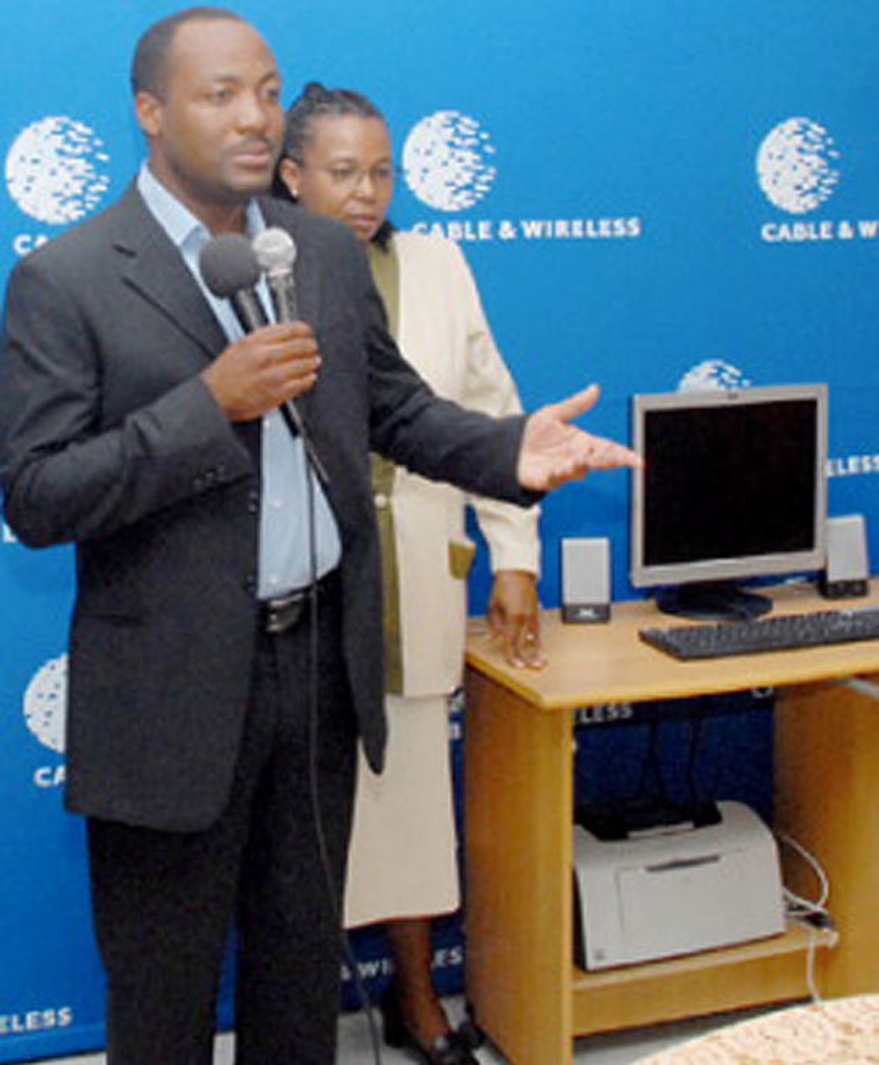 Brian Lara donates $10,000 and computers to a charity home, Barbados, August 11, 2007