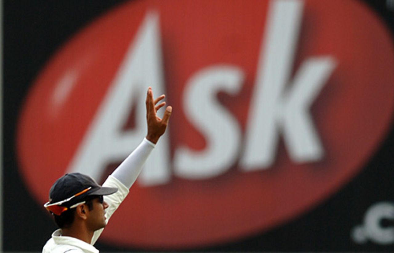 Rahul Dravid directs his field in front of poster, England v India, 3rd Test, The Oval, 4th day, August 12, 2007