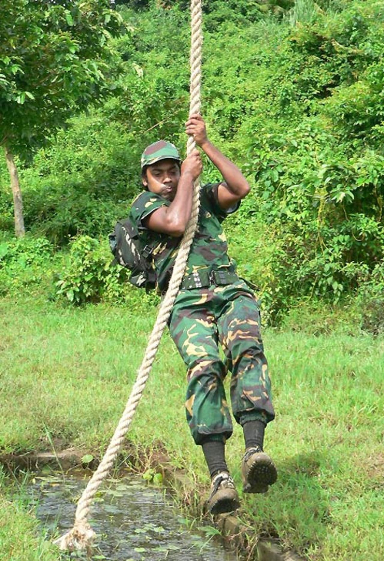 Syed Rasel completes a tarzan swing at the School of Infantry and Tactics, Sylhet, August 14, 2007 