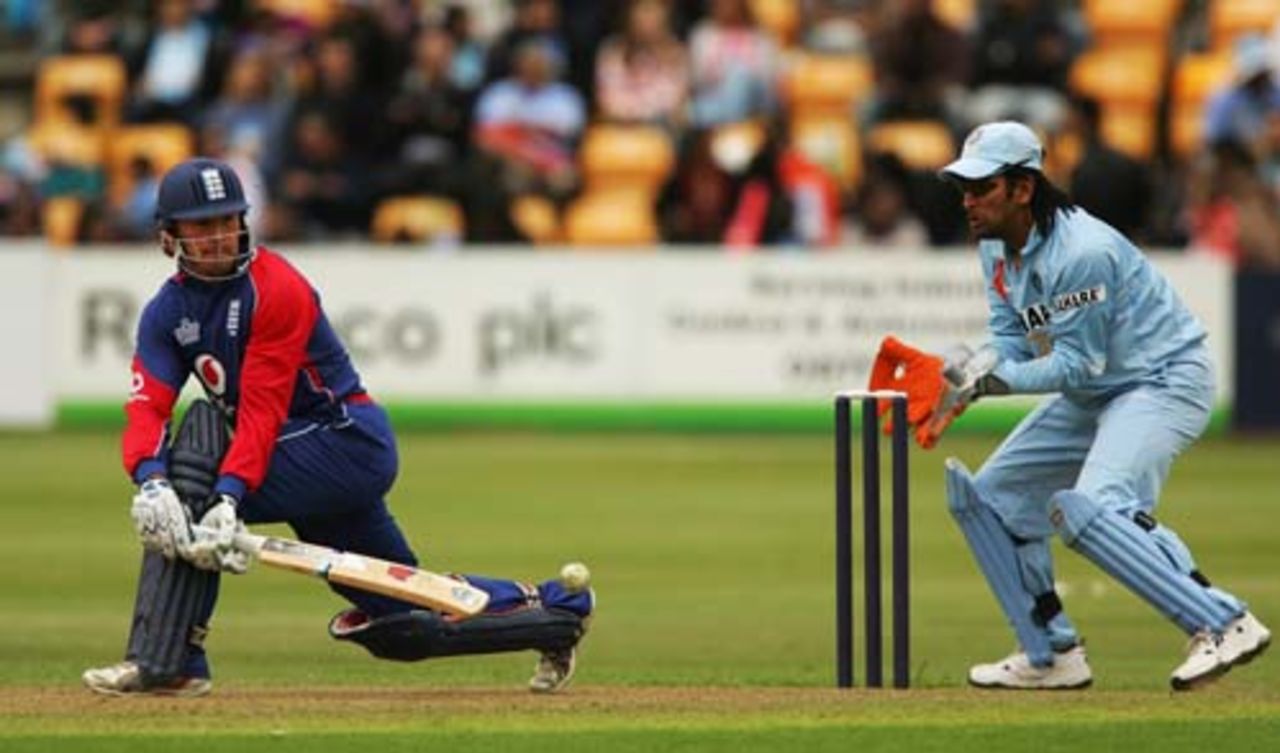 Paul Nixon plays the reverse-sweep while Mahendra Singh Dhoni looks on, England Lions v Indians, ODI warm-up, Northampton, August 18, 2007
