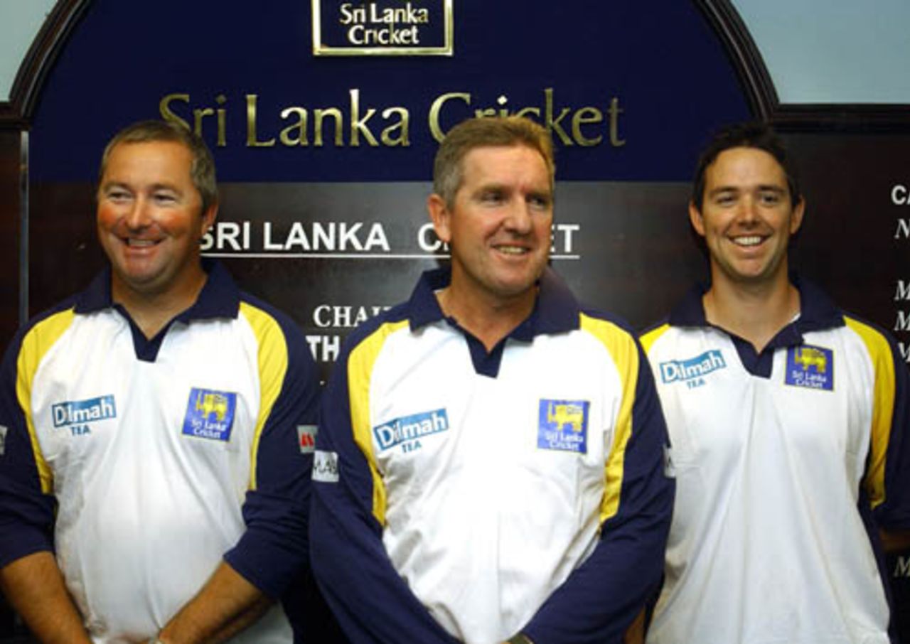 Assistant coach Paul Farbrace, Trevor Bayliss, and trainer Jade Roberts pose after a press conference, Colombo, August 20, 2007  
