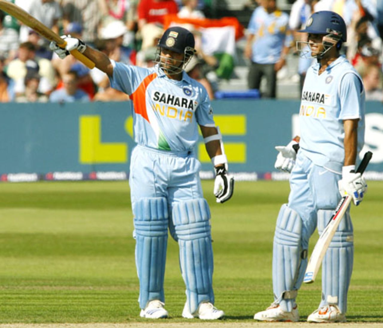Sachin Tendulkar celebrates his fifty as team-mate Sourav Ganguly looks on, England v India, 2nd ODI, Bristol, August 24, 2007
