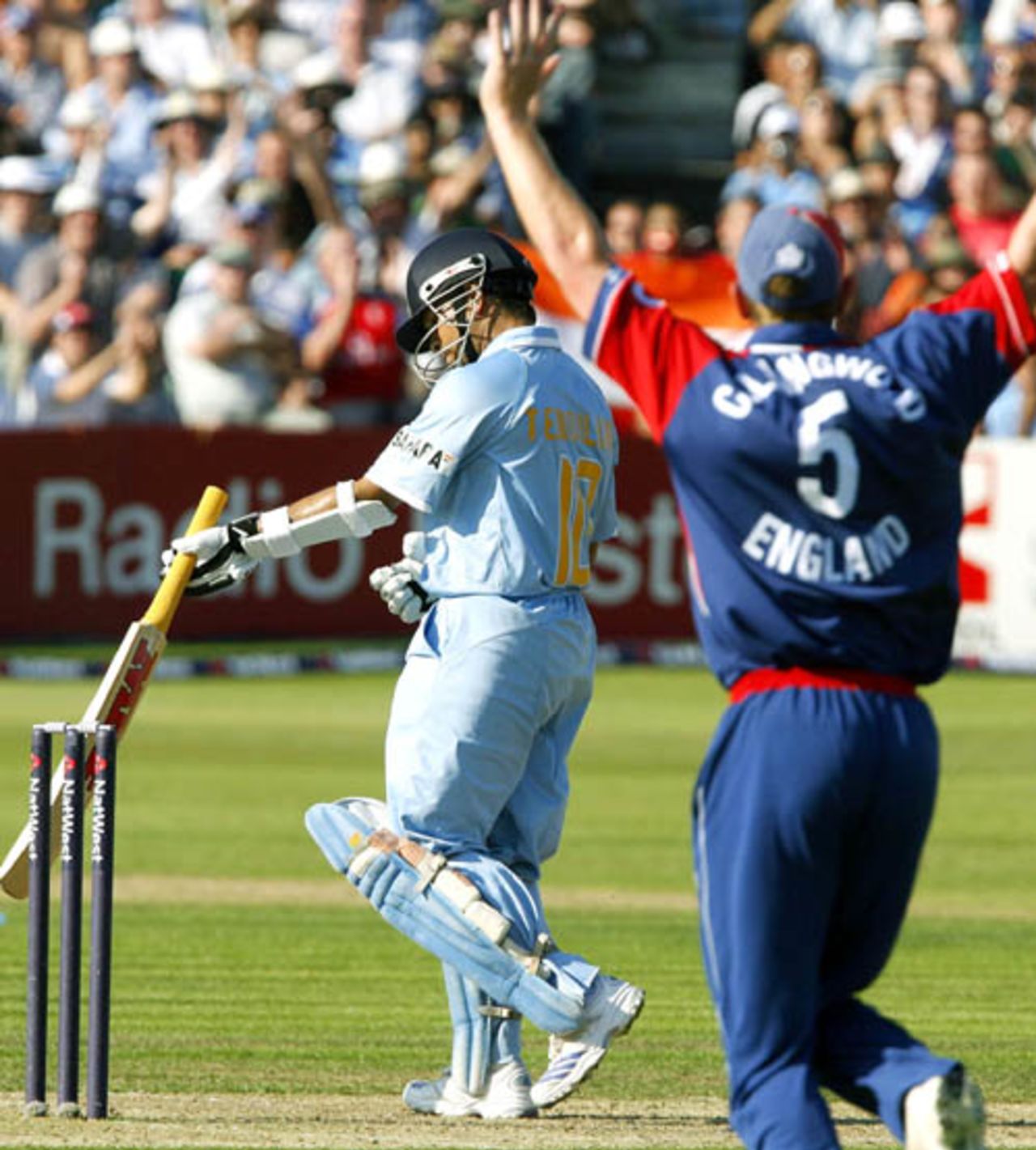 Sachin Tendulkar adjusts his arm guard as the England players make a successful appeal, England v India, 2nd ODI, Bristol, August 24, 2007