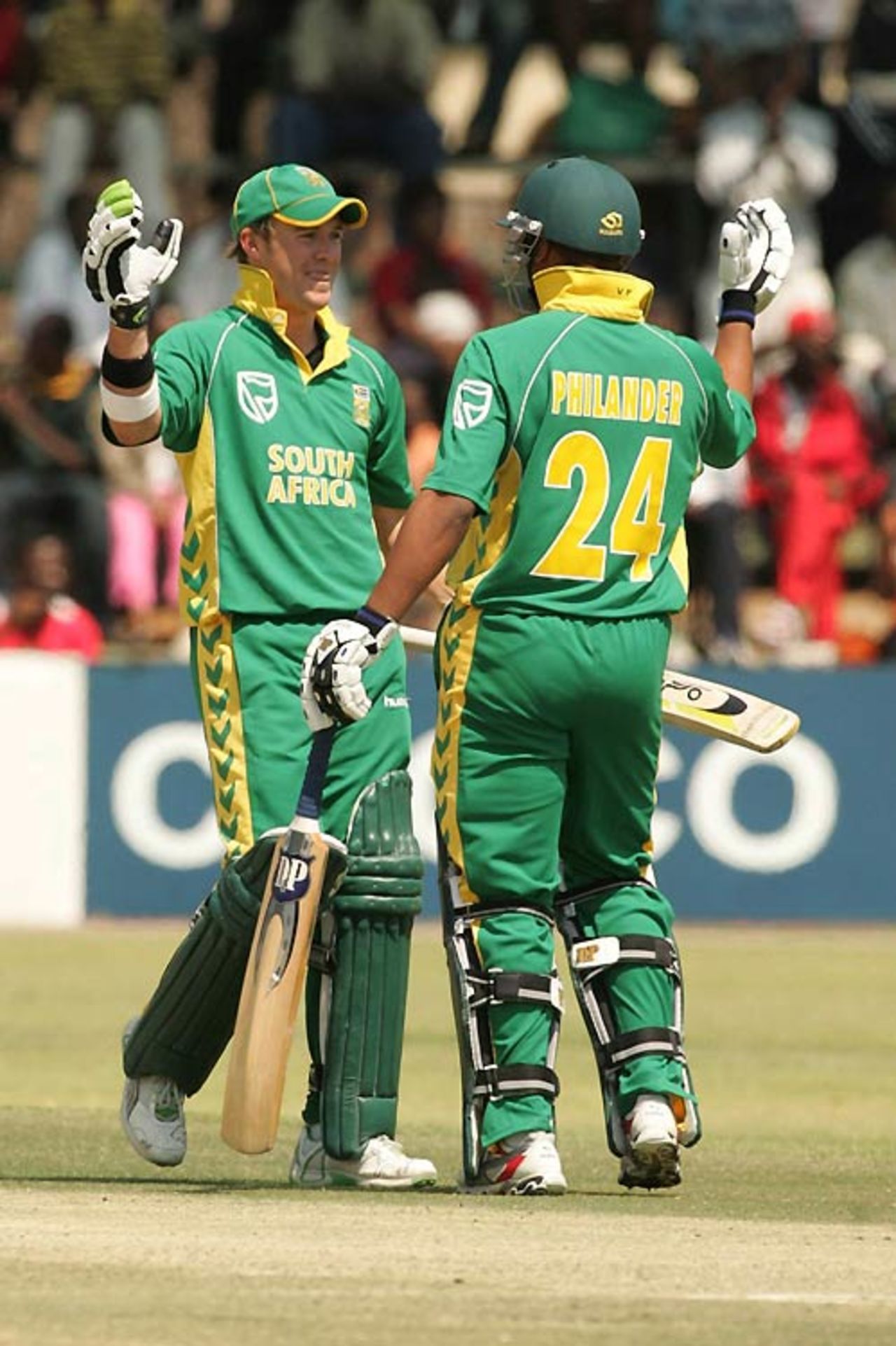 Vernon Philander congratulates AB de Villiers on reaching his century, Zimbabwe v South Africa, 3rd ODI, Harare, August 26, 2007