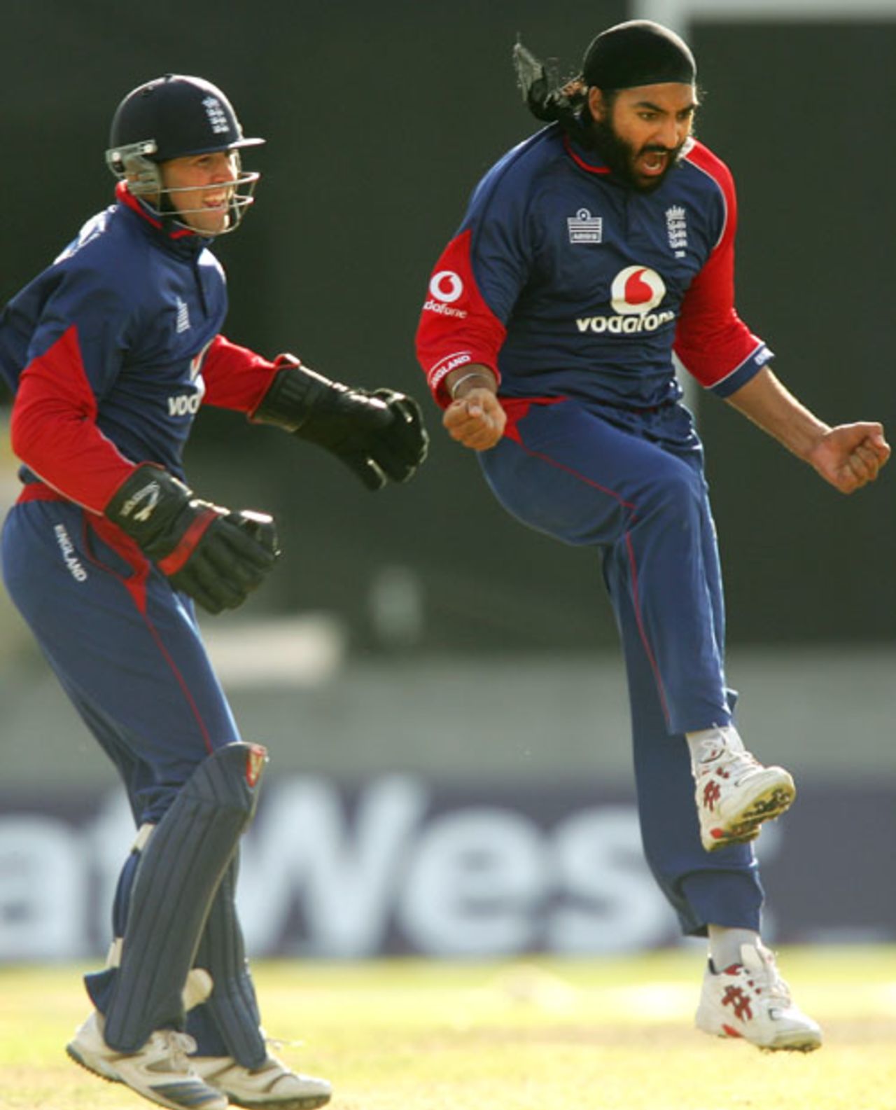 Monty Panesar is elated after dismissing Mahendra Singh Dhoni while Matt Prior looks on , England v India, 4th ODI, Old Trafford, August 30, 2007
