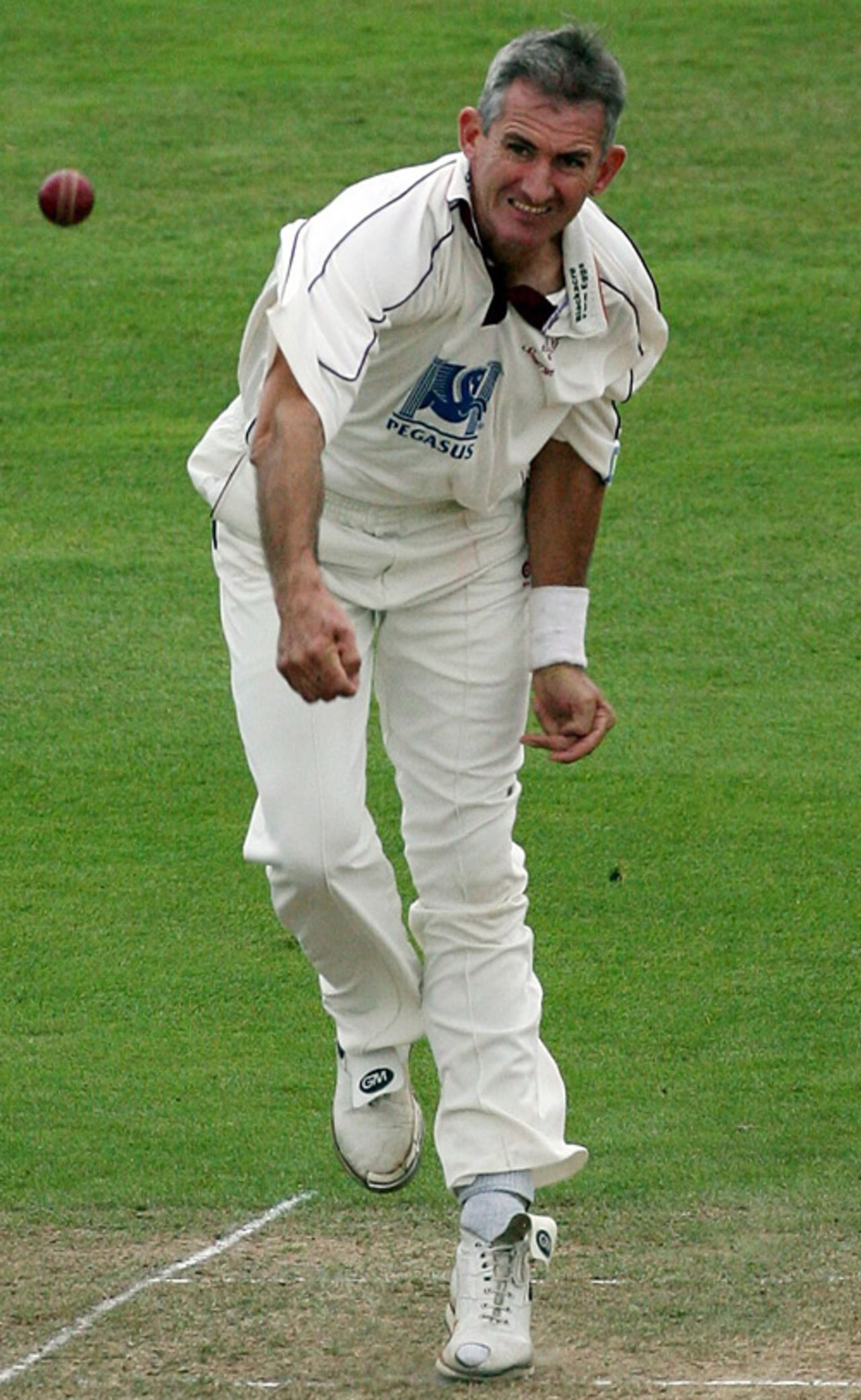 Andrew Caddick sends down another delivery, with a grimace, Somerset v Glamorgan, Taunton, August 31, 2007