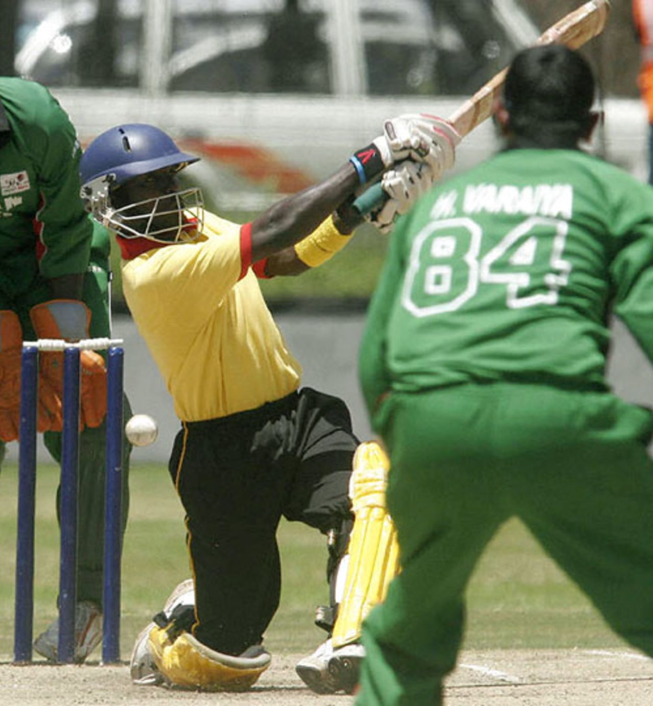 Joel Olwenyi misses a shot as Kenya's bowler Hiren Varaiya looks on, Kenya v Uganda, 3rd match, Twenty20 Quadrangular, Nairobi, September 2, 2007 