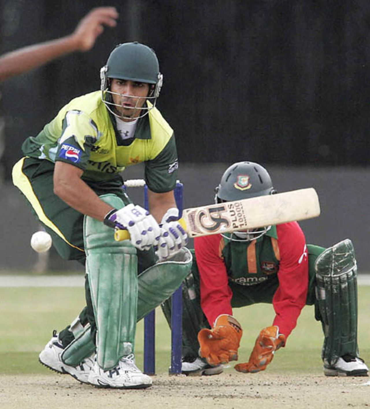 Salman Butt prepares to sweep, Pakistan v Bangladesh, Twenty20 Quadrangular, Nairobi, September 2, 2007