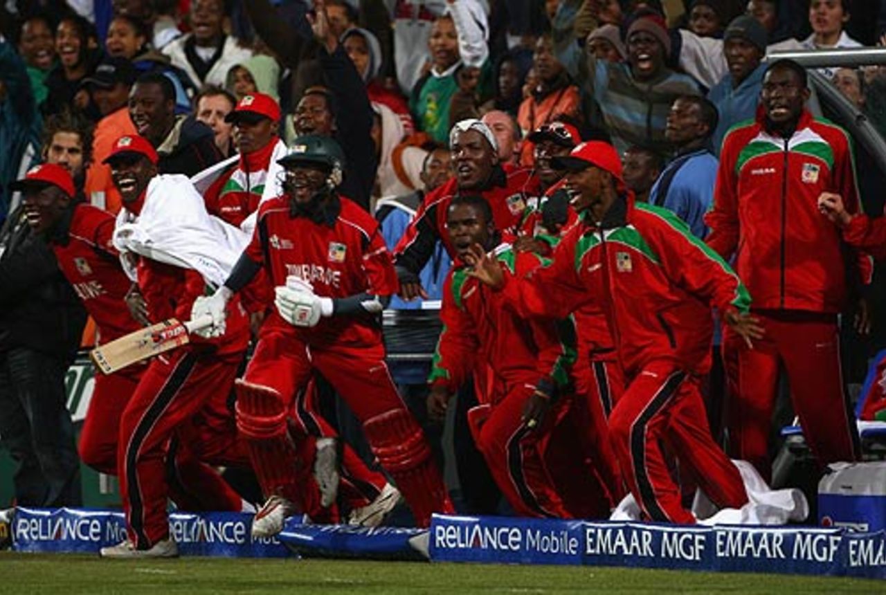 The Zimbabwe players race onto the field after their victory, Australia v Zimbabwe, Group B, ICC World Twenty20, Cape Town, September 12, 2007