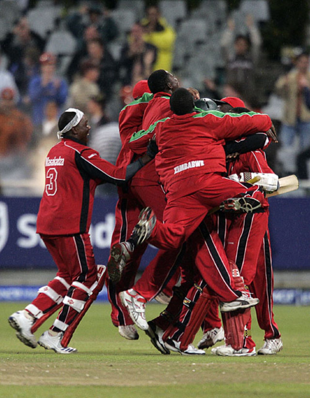 Zimbabwe players pile on top of match hero Brendan Taylor, Australia v Zimbabwe, Group B, ICC World Twenty20, Cape Town, September 12, 2007