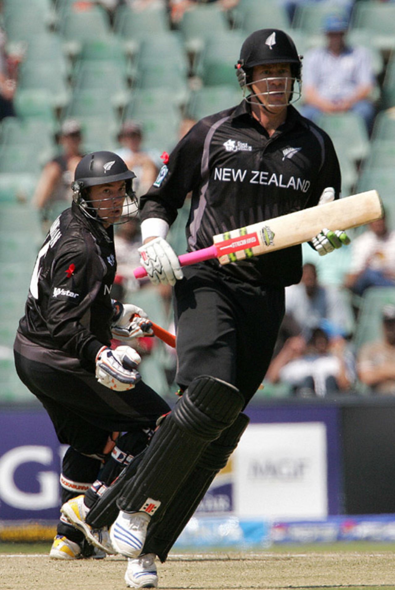 Jacob Oram and Craig McMillan pick up a single during their 74-run stand for the sixth wicket, India v New Zealand, Group E, ICC World Twenty20, Johannesburg, September 16, 2007