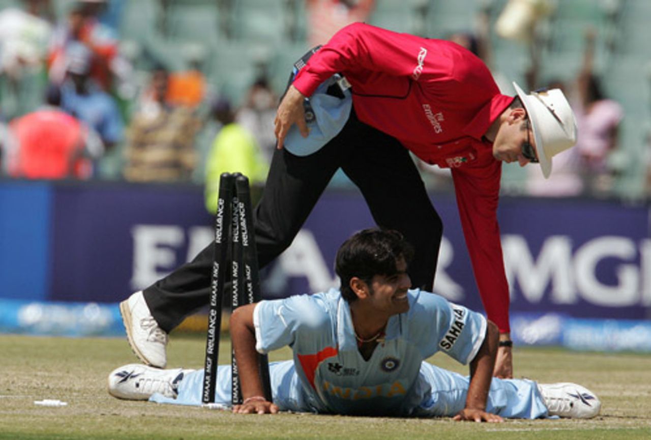 RP Singh lies spread-eagled after effecting a run out against Jeetan Patel, India v New Zealand, Group E, ICC World Twenty20, Johannesburg, September 16, 2007
