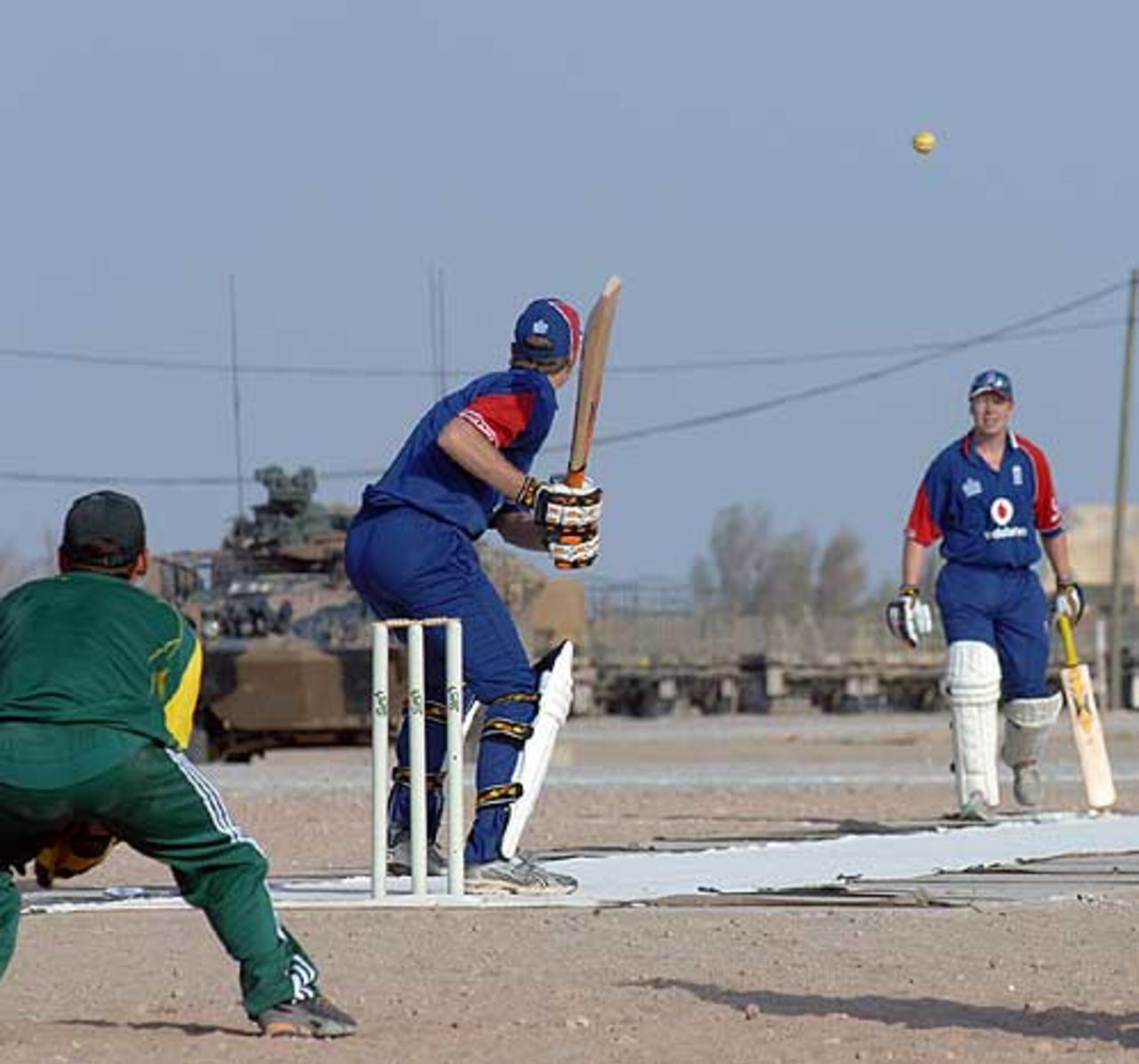 An England batsman sizes up a big hit during the Basra Ashes, England XI v Australia XI, September 14, 2007