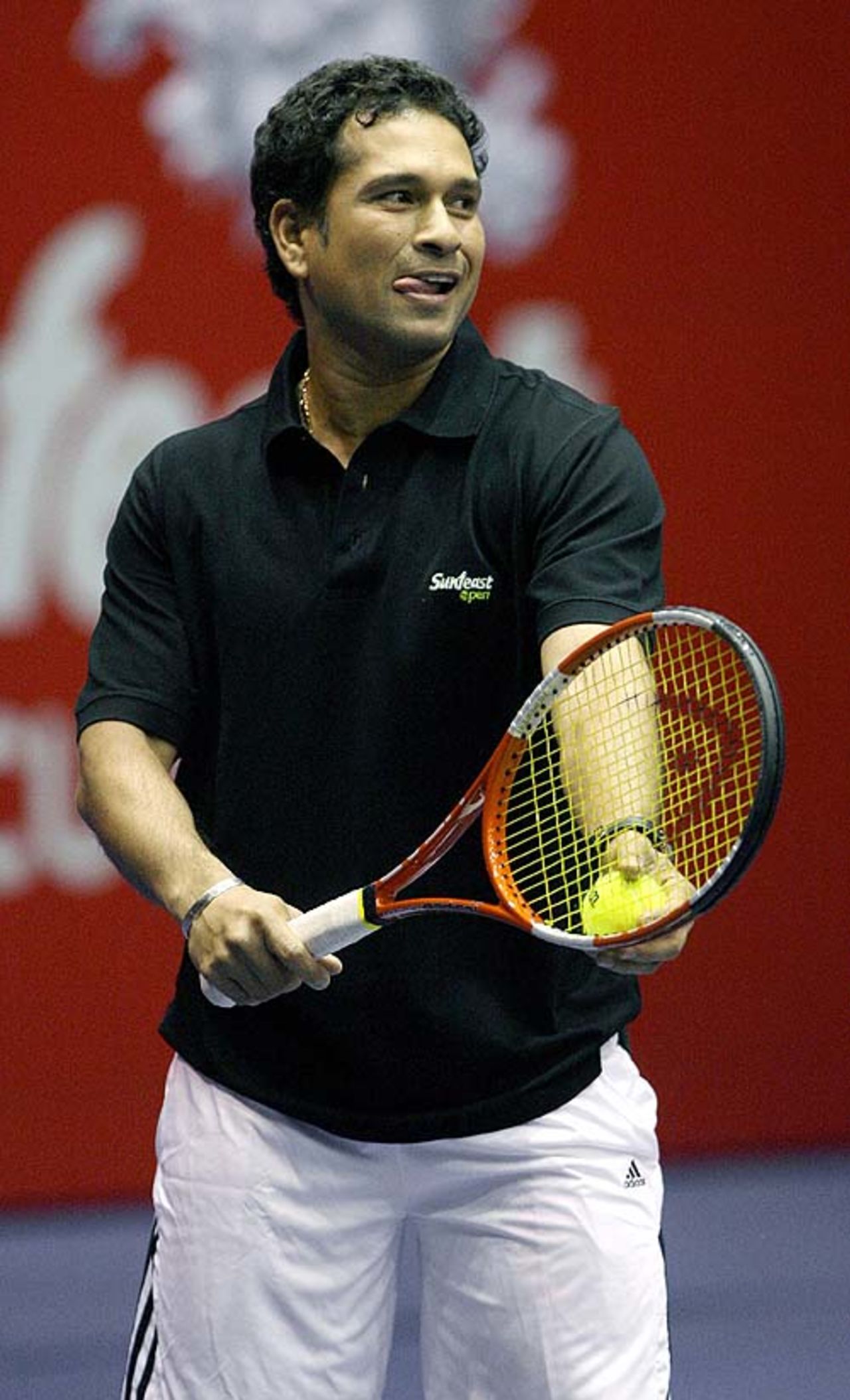 Sachin Tendulkar prepares to serve during an exhibition match, Kolkata, September 18, 2007