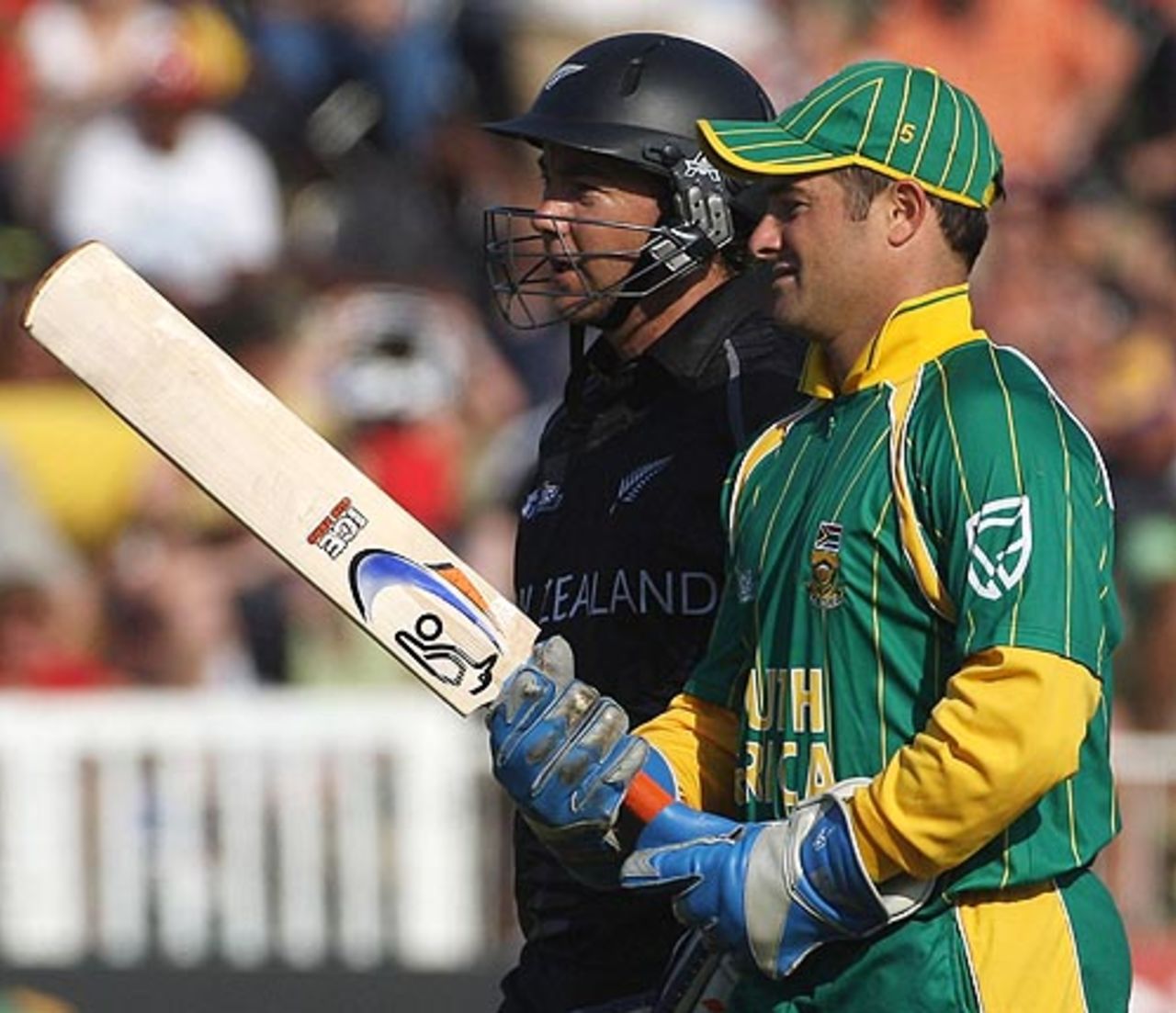 Mark Boucher takes a look at Craig McMillan's bat  while the players walk off the field, South Africa v New Zealand, Group E, ICC World Twenty20, Durban, September 19, 2007