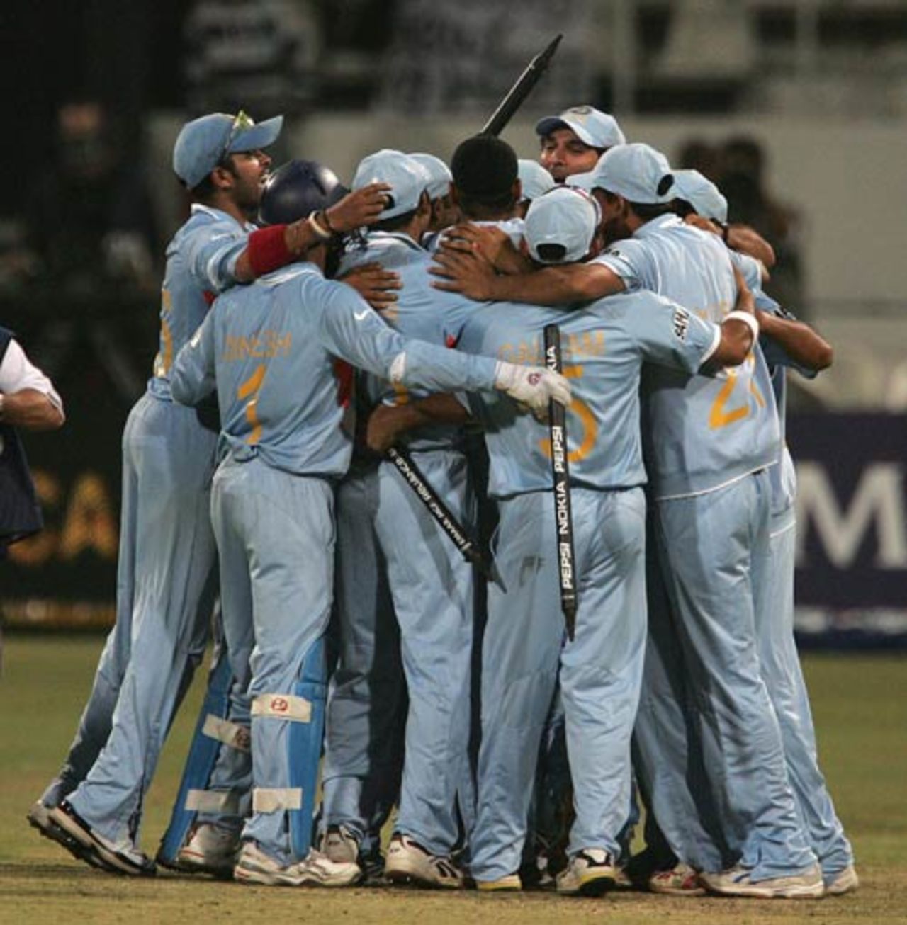 Indian players huddle after clinching a semi-final spot, India v South Africa, Group E, ICC World Twenty20, Durban, September 20, 2007