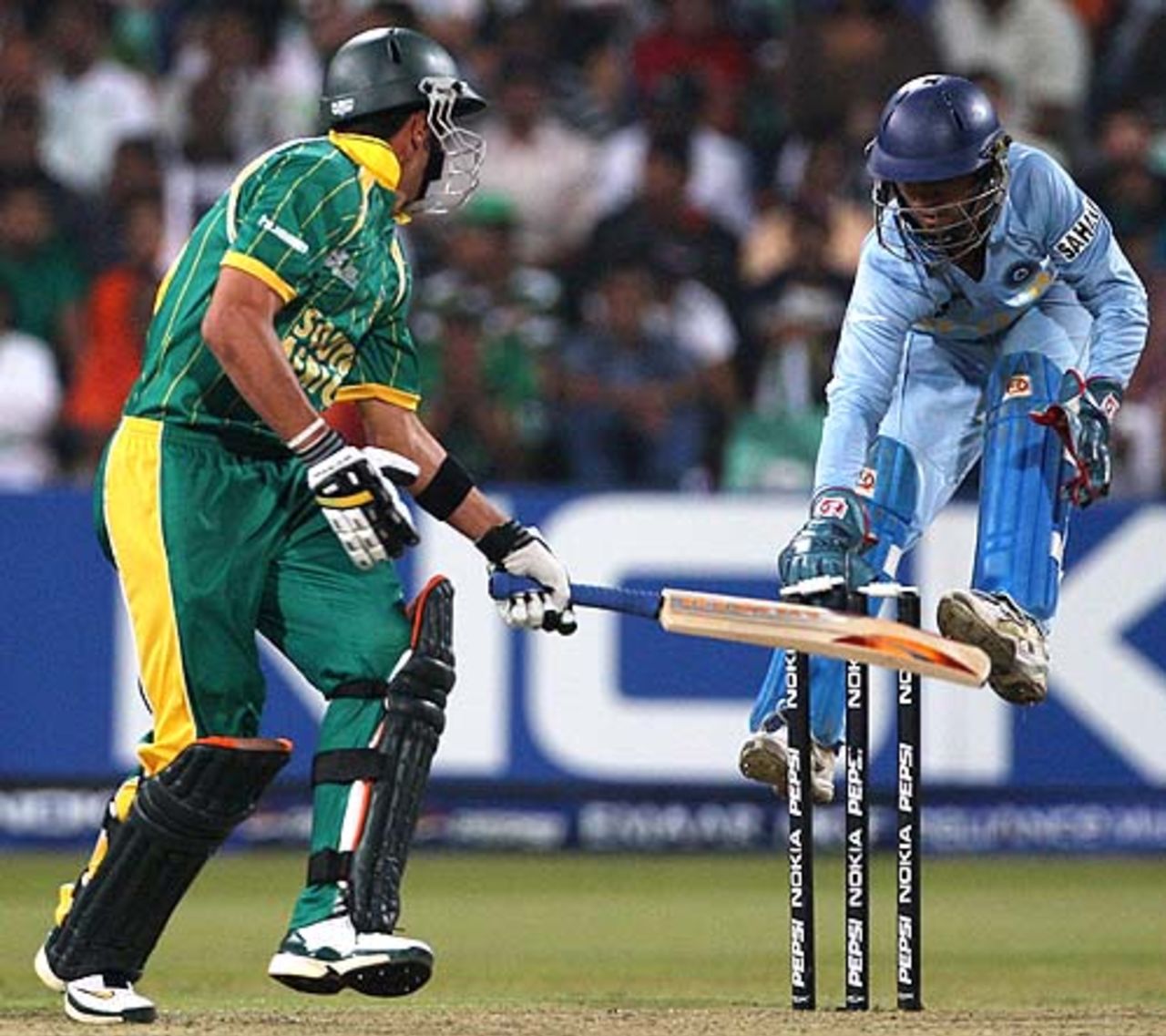 Johan van der Wath is caught short of the crease by Dinesh Karthik, India v South Africa, Group E, ICC World Twenty20, Durban, September 20, 2007