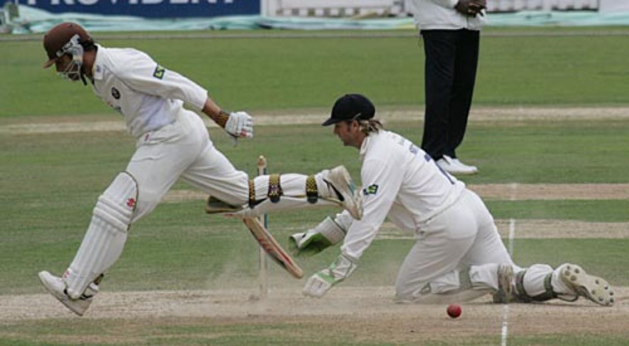 Mark Ramprakash scurries home as Luke Sutton scrambles for the ball, Surrey v Lancashire, The Oval, September 21, 2997