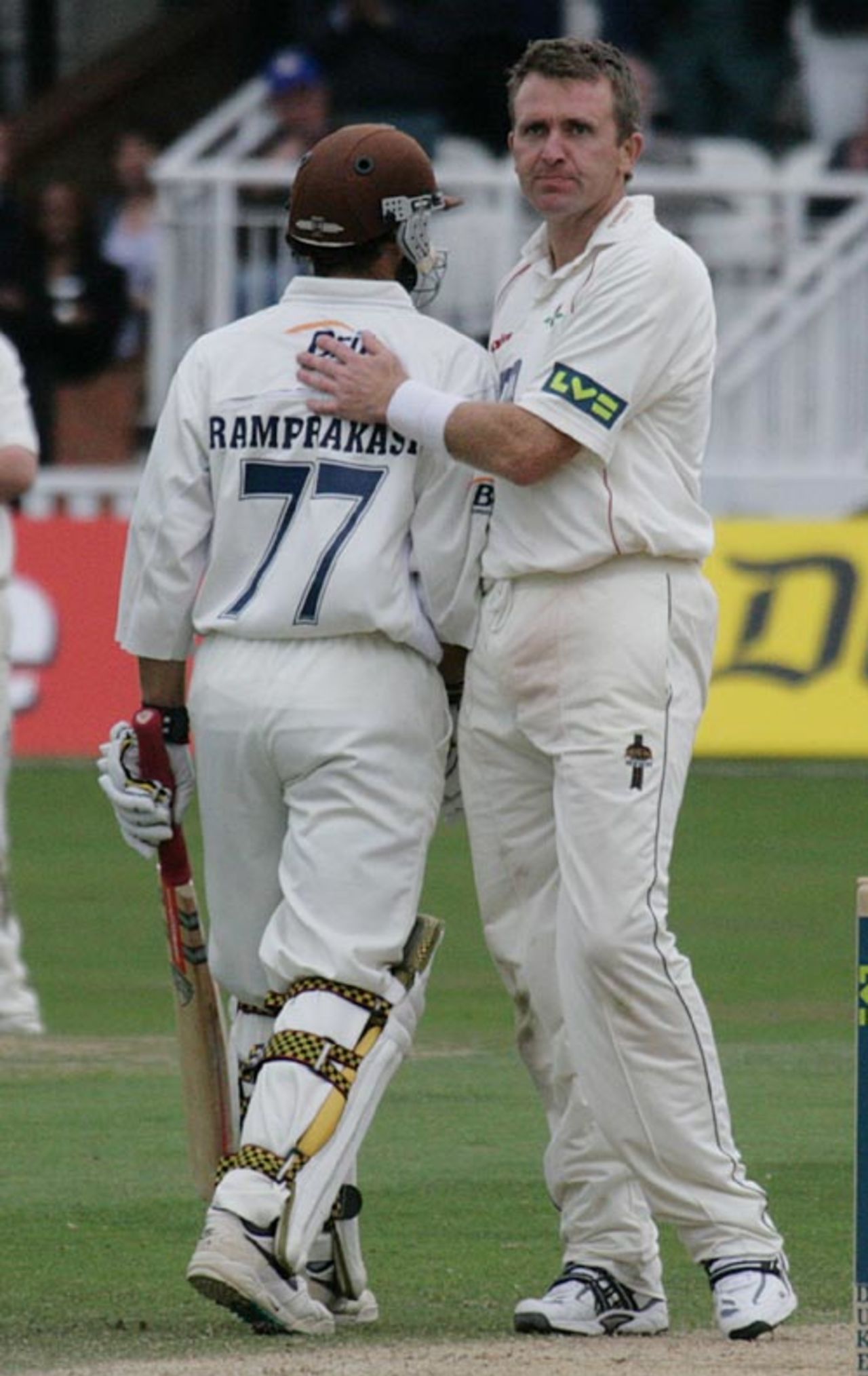 Dominic Cork congratulates Mark Ramprakash on his second hundred of the match, Surrey v Lancashire, The Oval, September 21, 2997