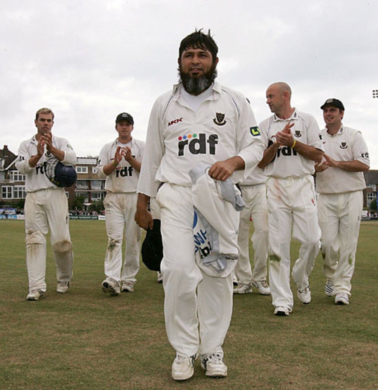 Mushtaq Ahmed leads Sussex off after taking 13 wickets in the match, Sussex v Worcestershire, Hove, September 21, 2007 
