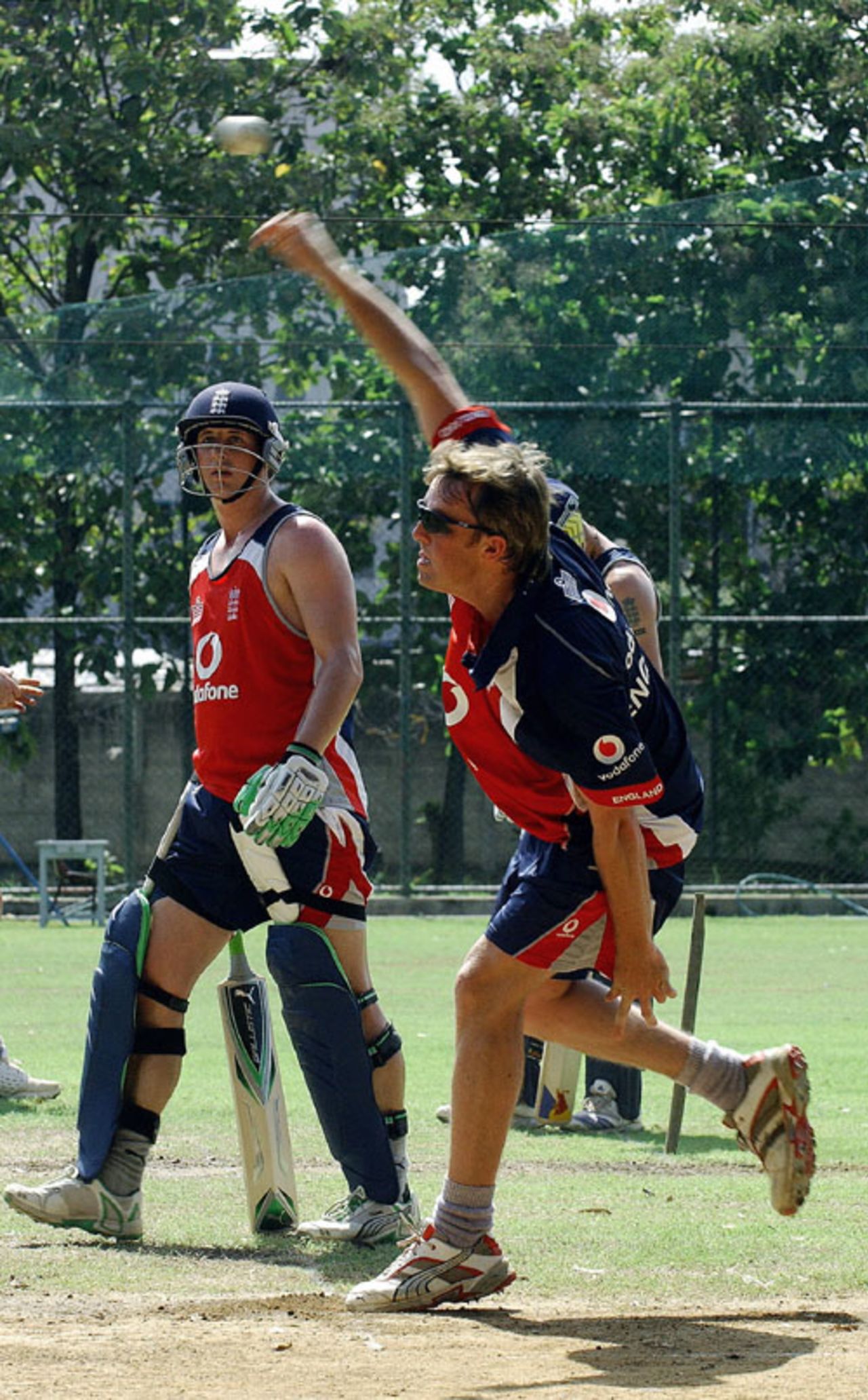 Graeme Swann bowls, watched by Phil Mustard, during England's practice session, R Premadasa Stadium, Colombo, September 26, 2007
