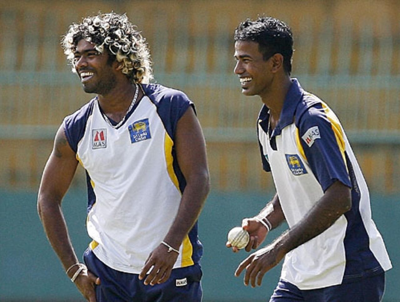 A light-hearted moment for Lasith Malinga and Nuwan Kulasekara at the Premadasa Stadium, Colombo, September 27, 2007 