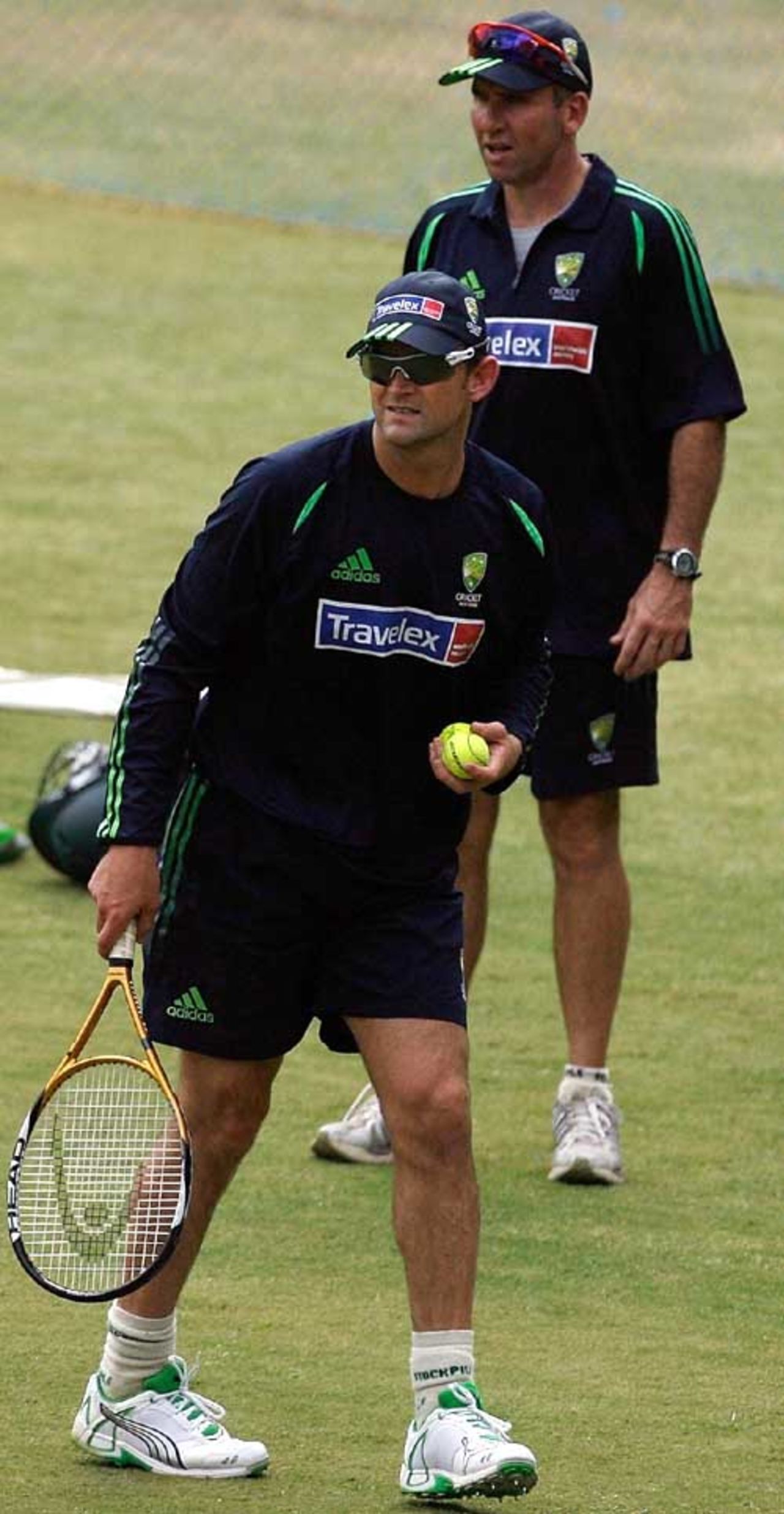 Tim Nielsen, the Australian coach, supervises while Adam Gilchrist plays tennis, India v Australia ODI series, M Chinnaswamy Stadium, Bangalore, September 27, 2007