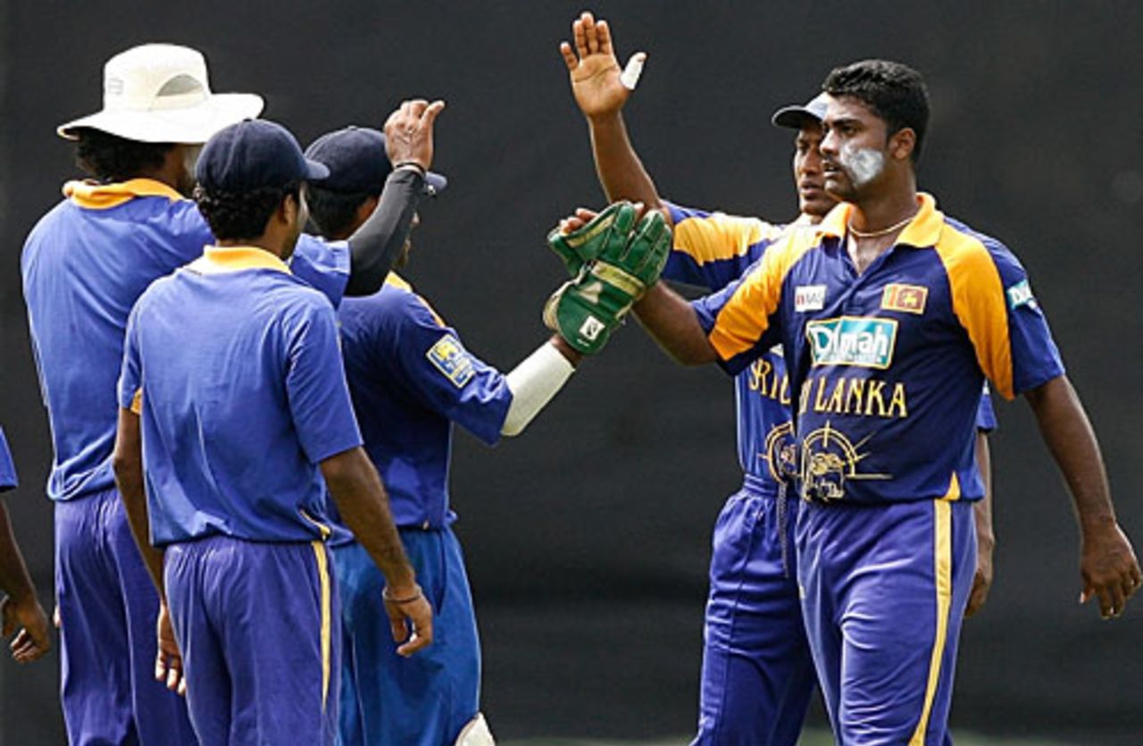 Sri Lankan team-mates congratulate Sujeewa de Silva for dismissing Phil Mustard, Sri Lanka Cricket XI v England XI, P Saravanamuttu Stadium, Colombo, September 28, 2007