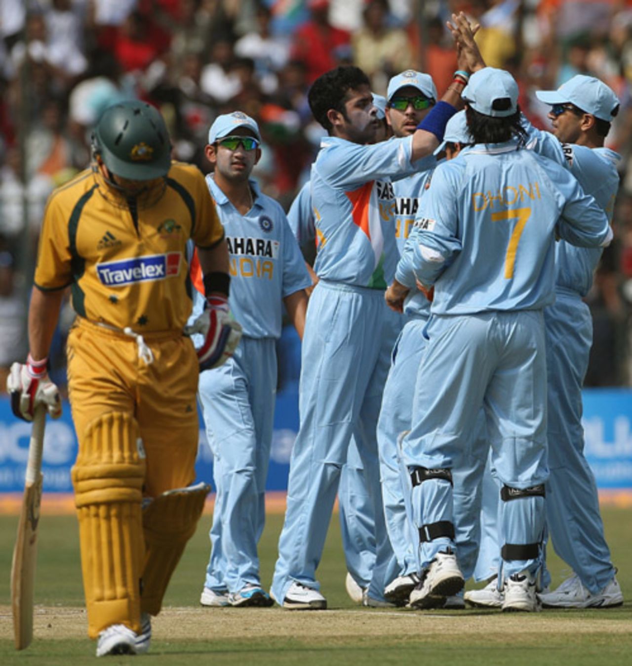 Brad Hodge walks back after being dismissed by Sreesanth, India v Australia, 1st ODI, Bangalore, September 29, 2007