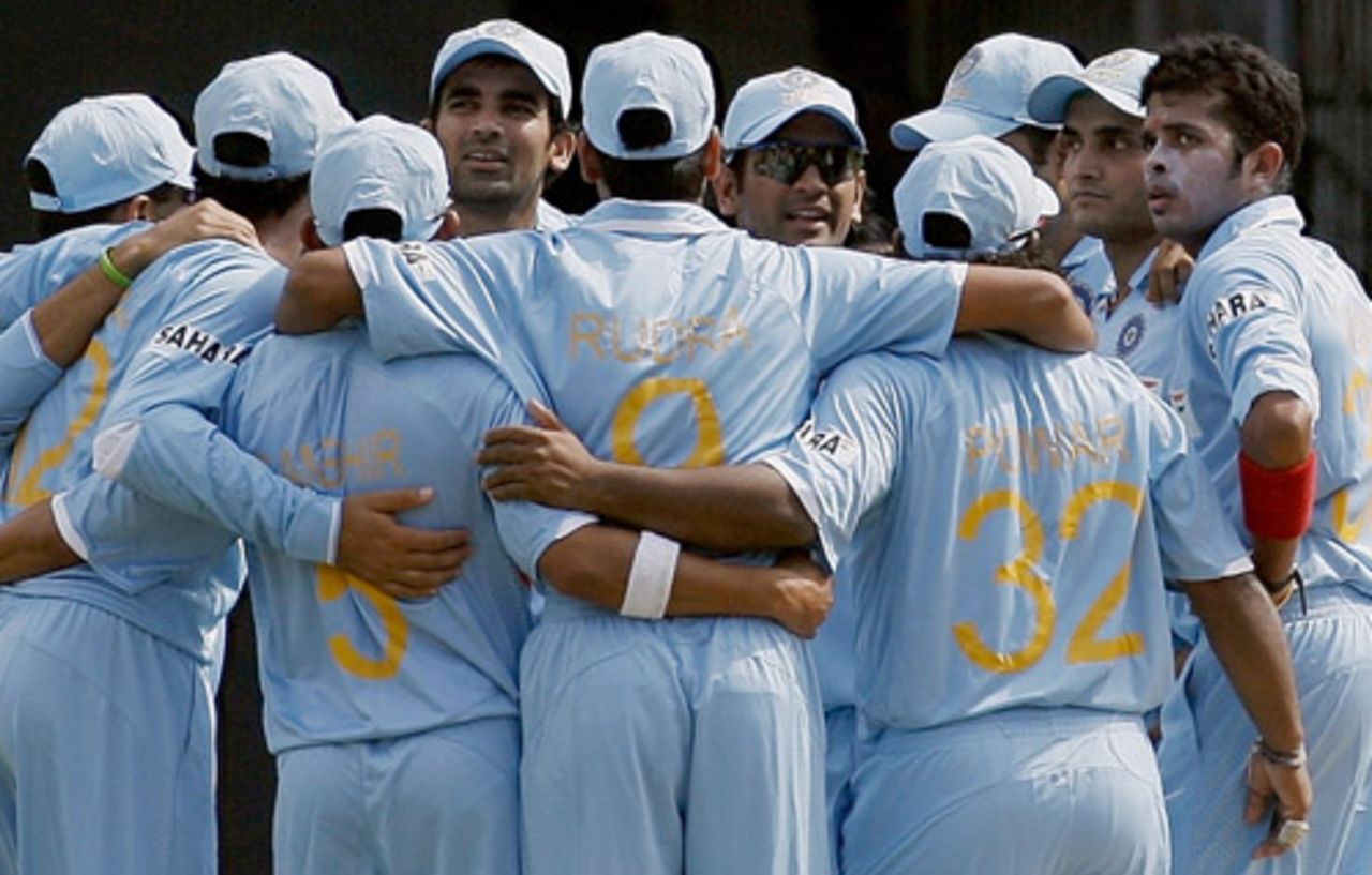 The Indian team in a huddle after the fall of a wicket, India v Australia, 1st ODI, Bangalore, September 29, 2007