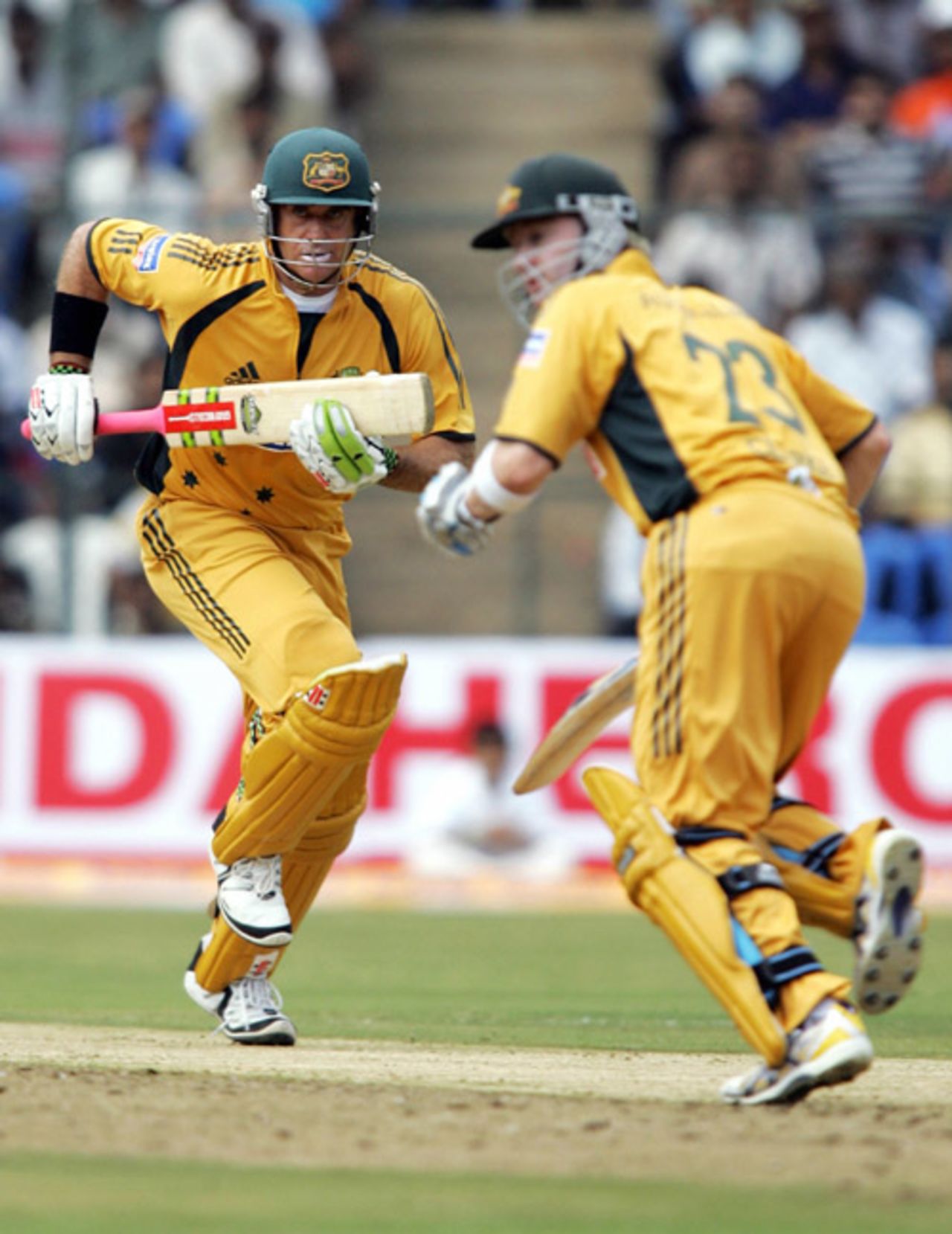 Matthew Hayden and Michael Clarke take a run during their 60-run partnership for the third wicket 