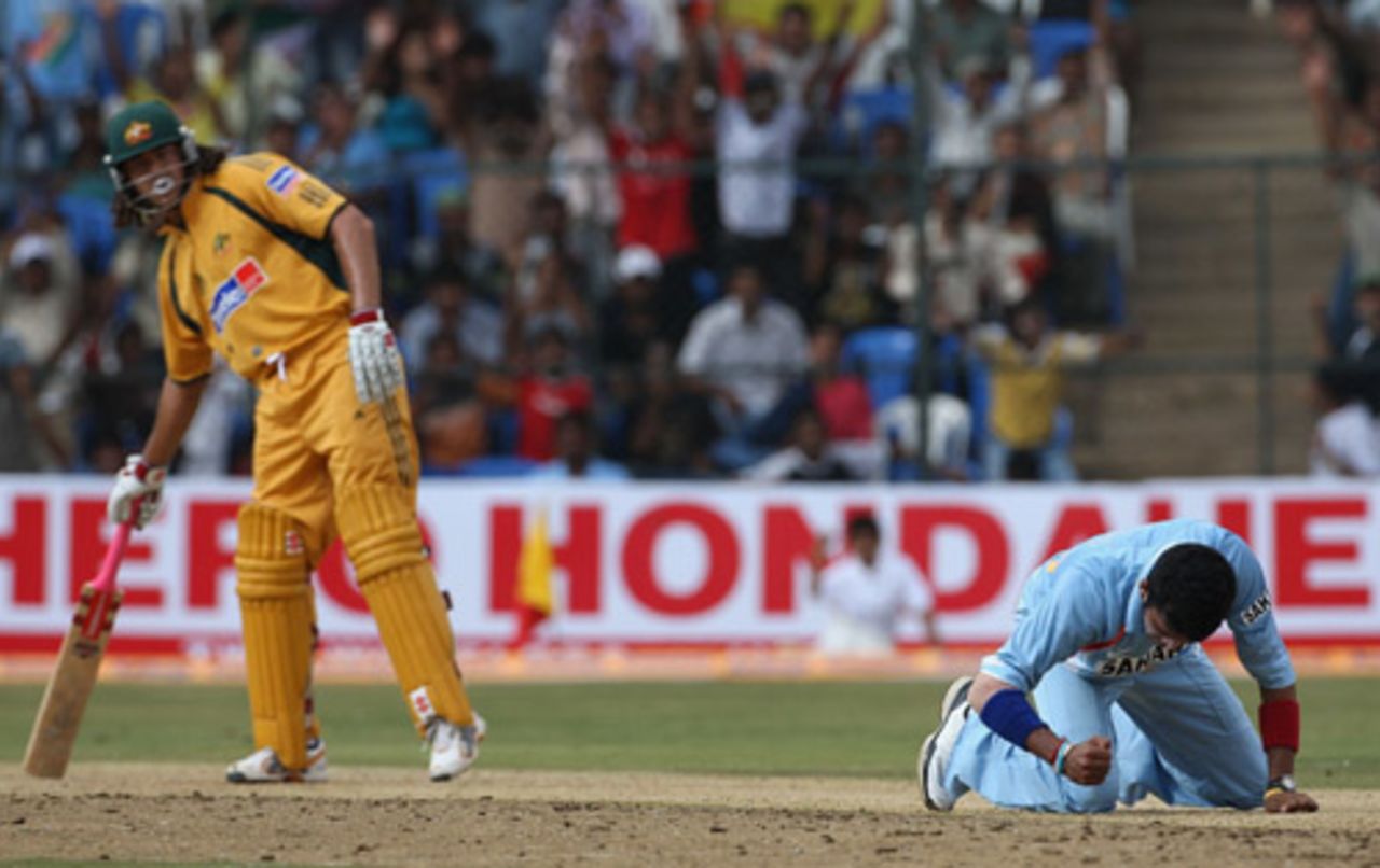 Sreesanth celebrates Andrew Symonds' wicket by pounding the pitch, India v Australia, 1st ODI, Bangalore, September 29, 2007