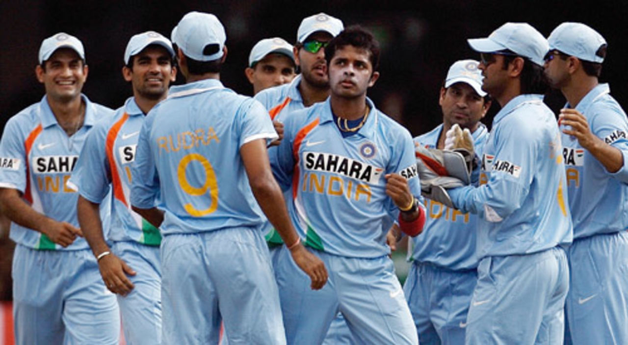 Sreesanth is surrounded by his team-mates after taking a wicket, India v Australia, 1st ODI, Bangalore, September 29, 2007


