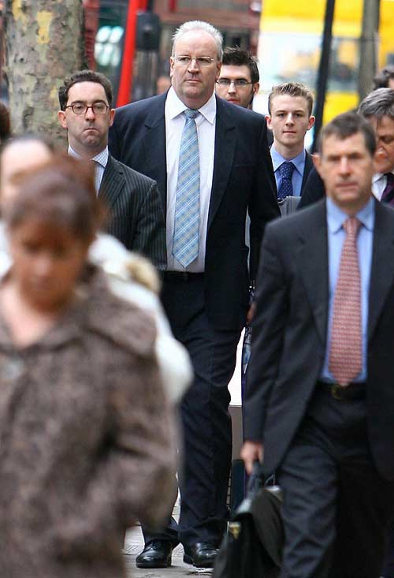 Darrell Hair walks to the High Court in London ahead of his employment tribunal, October 1, 2007