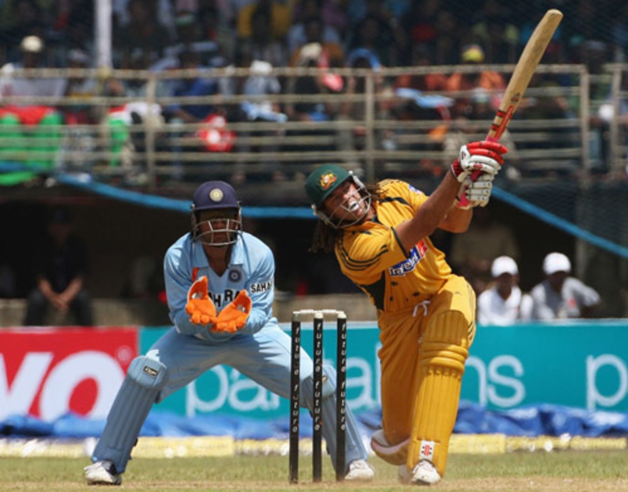 Andrew Symonds heaves one over midwicket while Mahendra Singh Dhoni looks on, India v Australia, 2nd ODI, Kochi, October 2, 2007