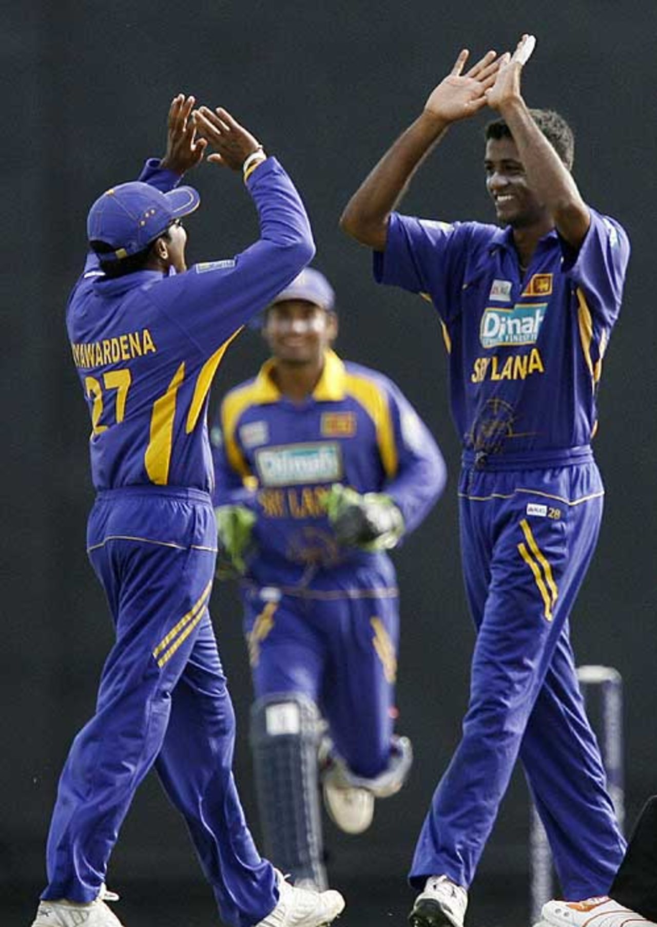 Mahela Jayawardene congratulates Farveez Maharoof for another wicket, Sri Lanka v England, 2nd ODi, Dambulla, October 4, 2007