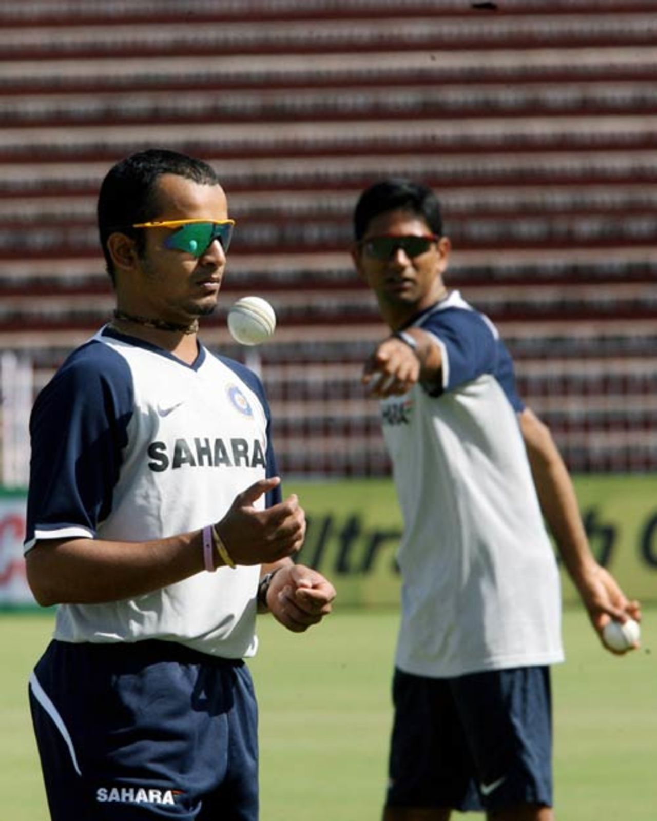 Venkatesh Prasad, India's bowling coach, and Murali Kartik in the nets  on the eve of the fourth ODI in Chandigarh, October 7, 2007