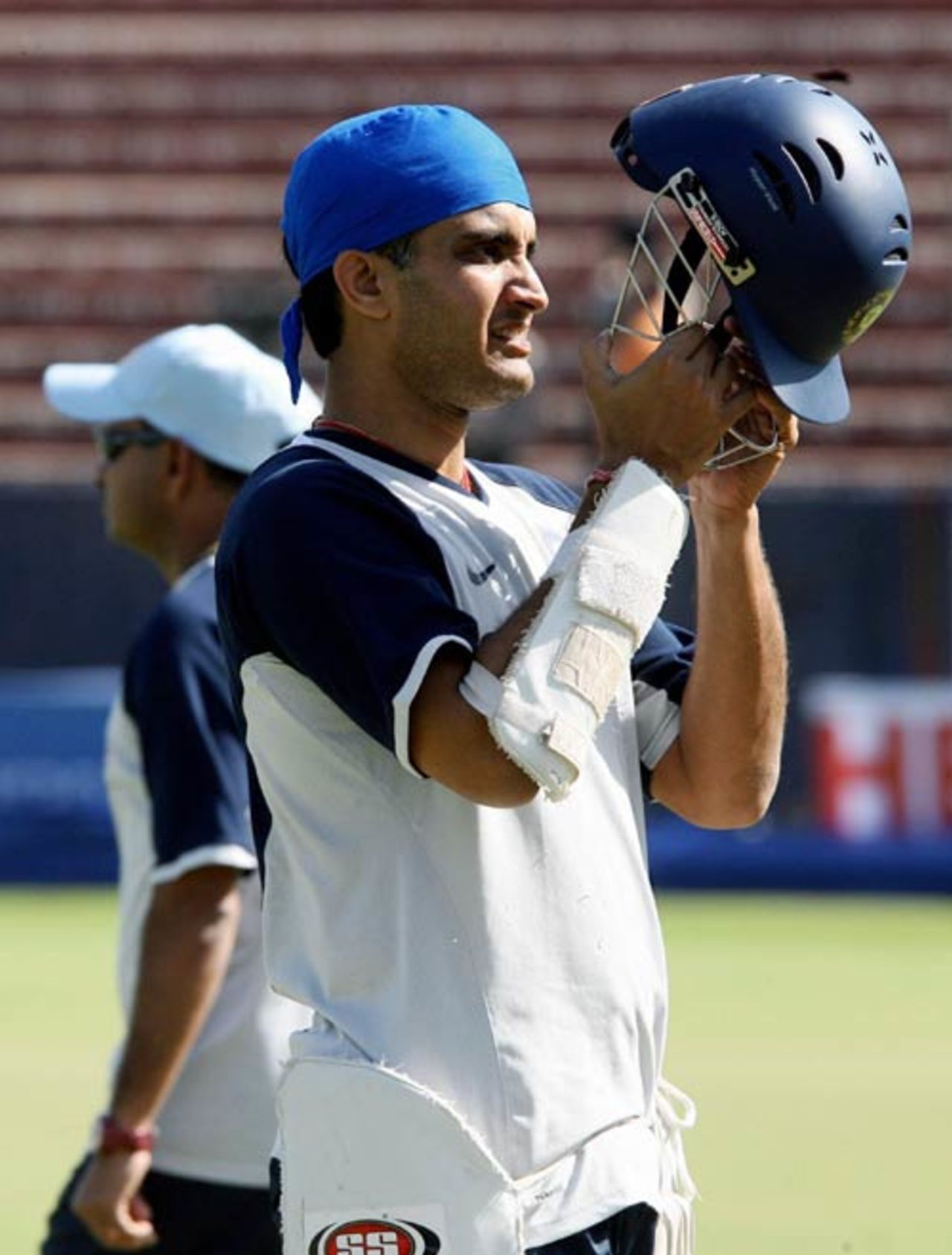 Sourav Ganguly inspects his helmet at the batting nets, Chandigarh, October 7, 2007