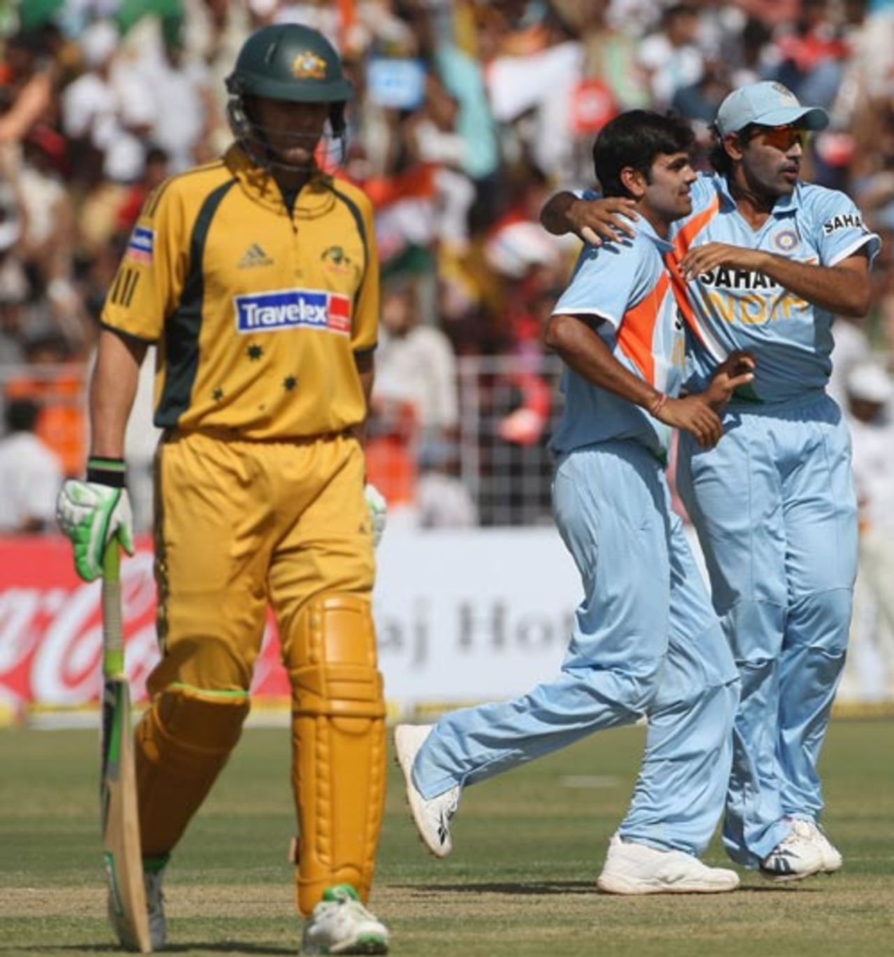 Robin Uthappa and RP Singh celebrate Adam Gilchrist's dismissal, India v Australia, 4th ODI, Chandigarh, October 8, 2007
